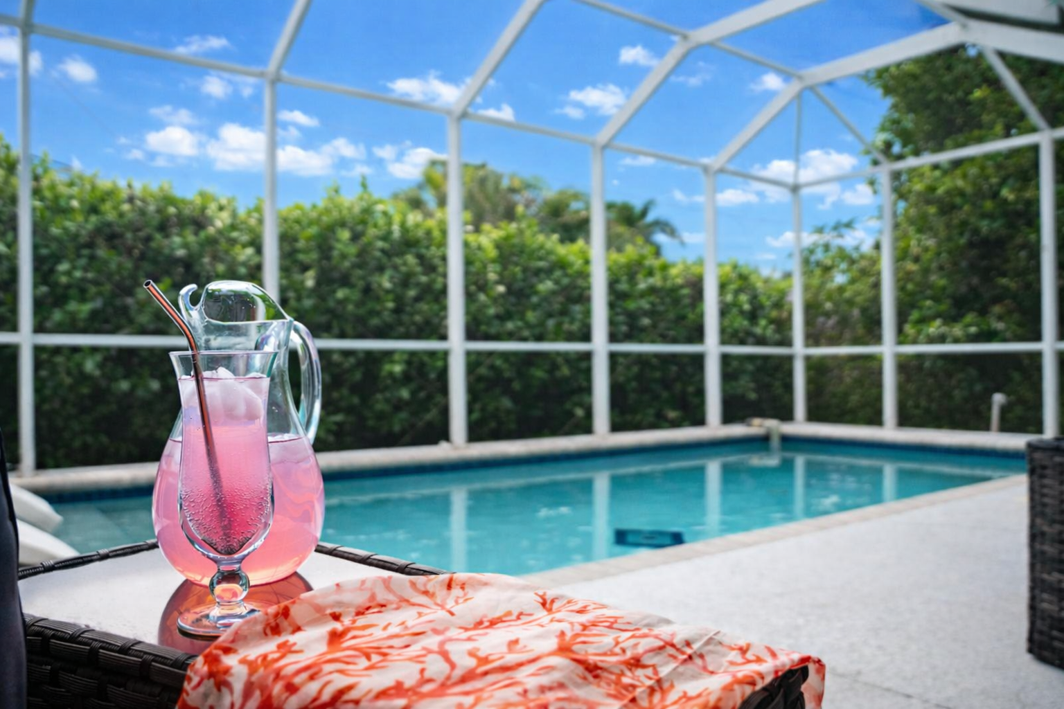 Large screened-in pool with southern exposure