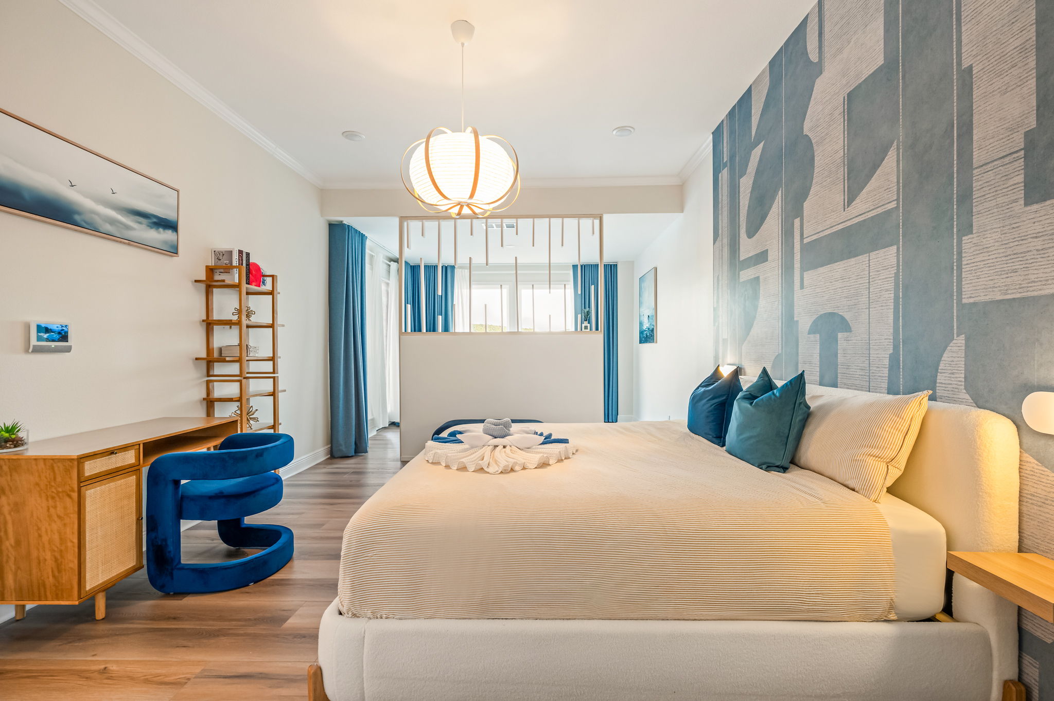 Elegant king suite featuring modern décor, cozy seating, and peaceful ambiance.