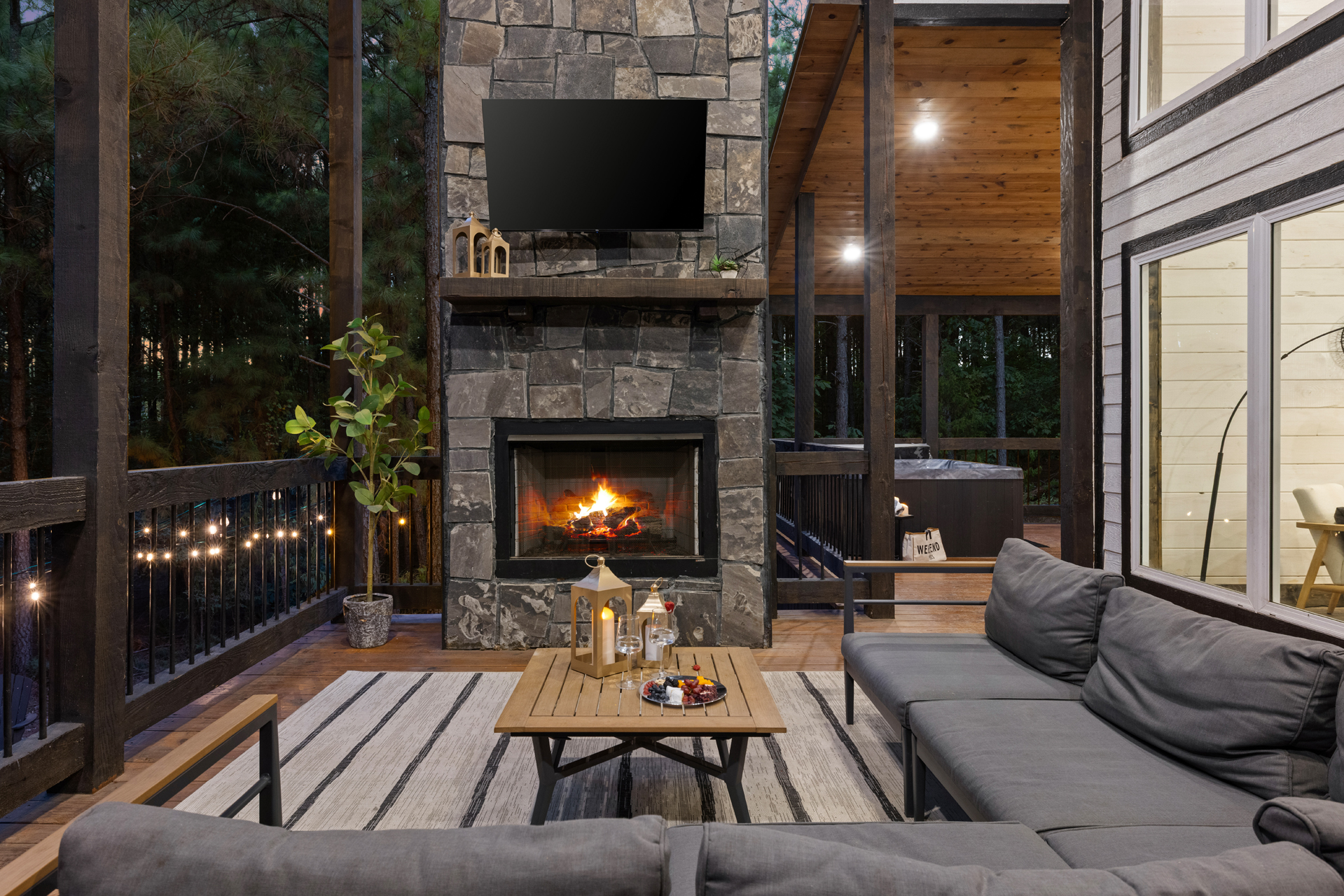 This is where evenings slow down. Cozy up by the outdoor fireplace, turn on the TV, and let the quiet woods be your backdrop.