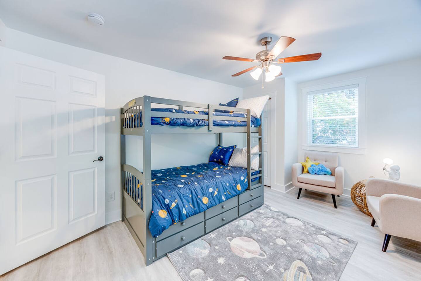 Cozy bunk bed, perfectly designed for kids, offering a fun and playful space for rest and adventure.