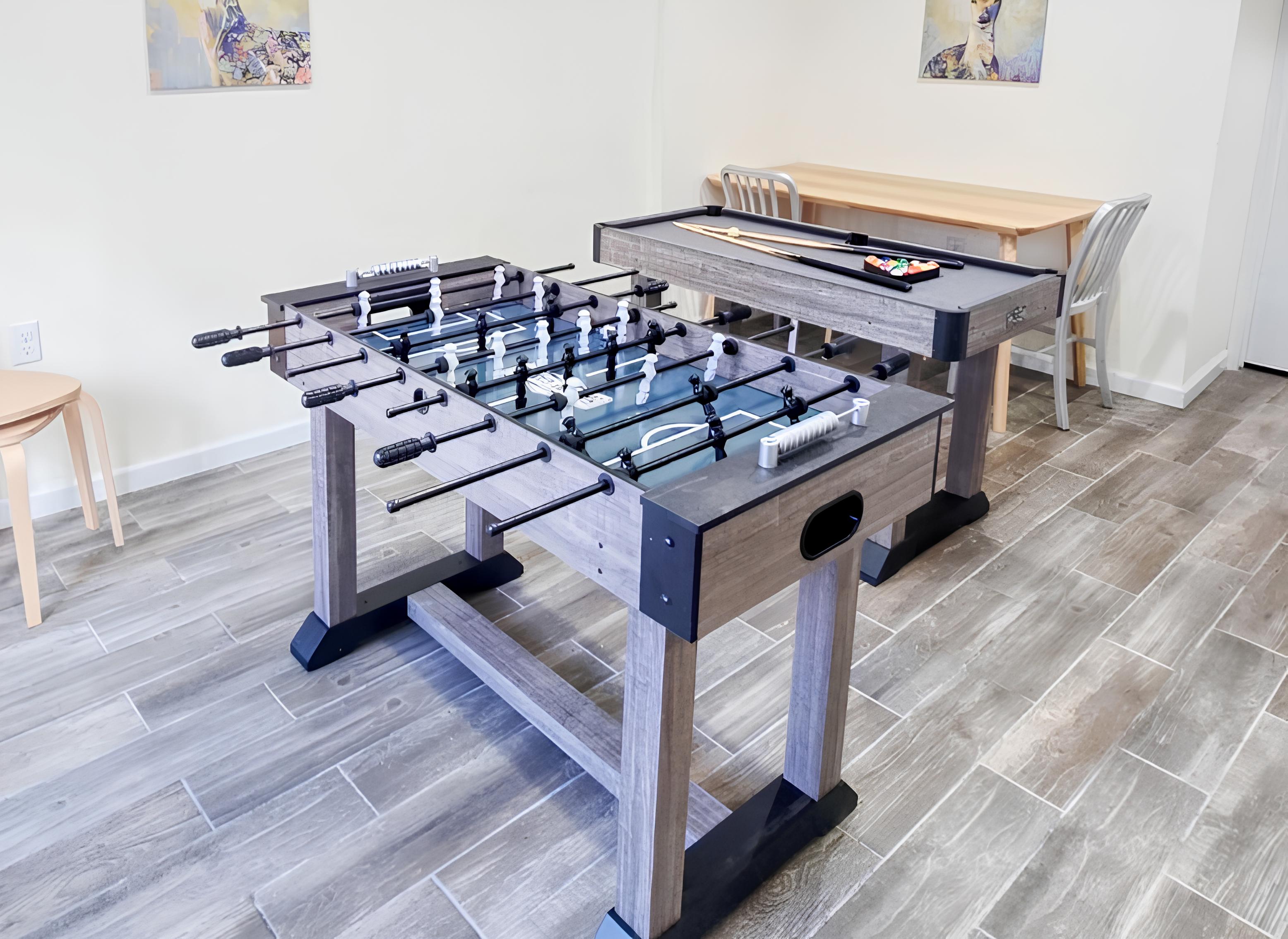 Lower level with Smart TV, PlayStation 5, foosball, mini pool table