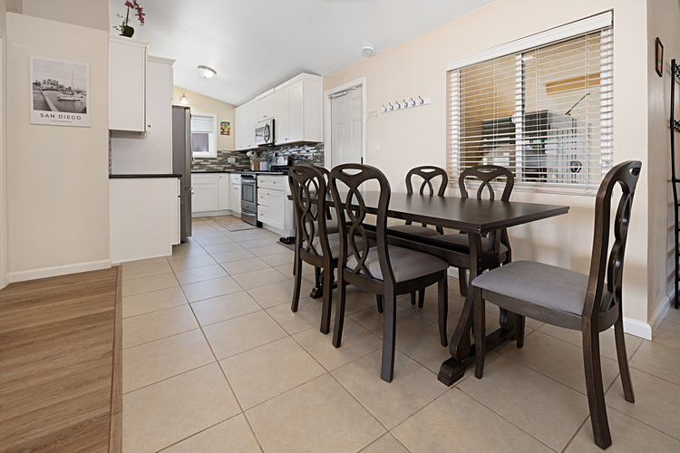 Dining area for 8.  Extra folding table and 4 chairs located in garage for extra seating.