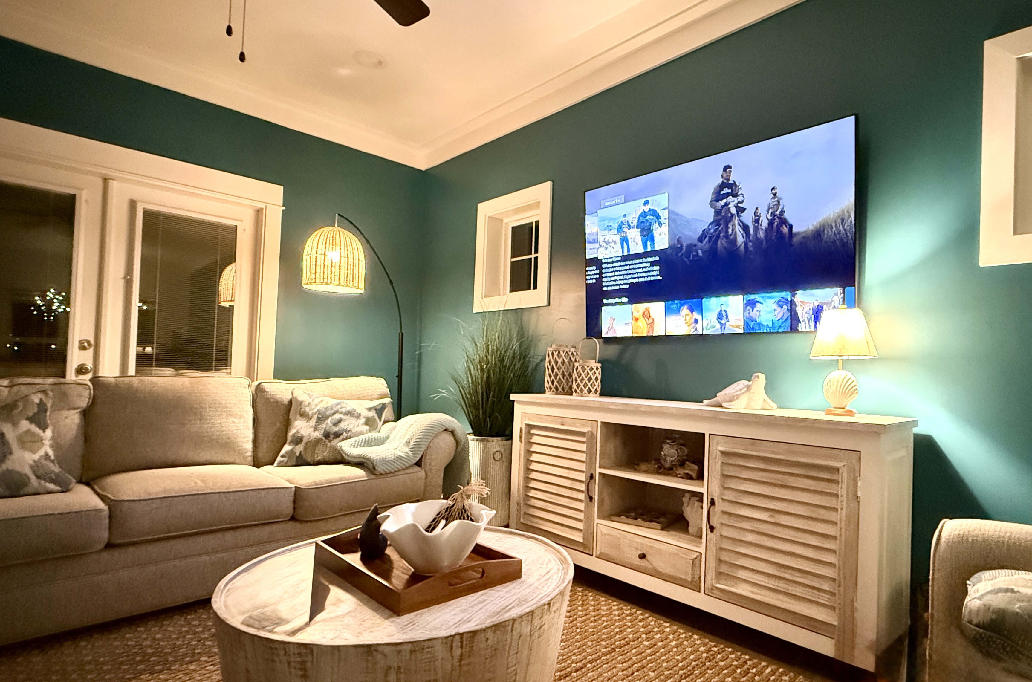 Relax in our living room and watch your favorite shows on the large TV with ROKU.  Stream all of your favorites.  Don't worry - there is plenty of seating for the whole group with two large couches and a couple of additional chairs.