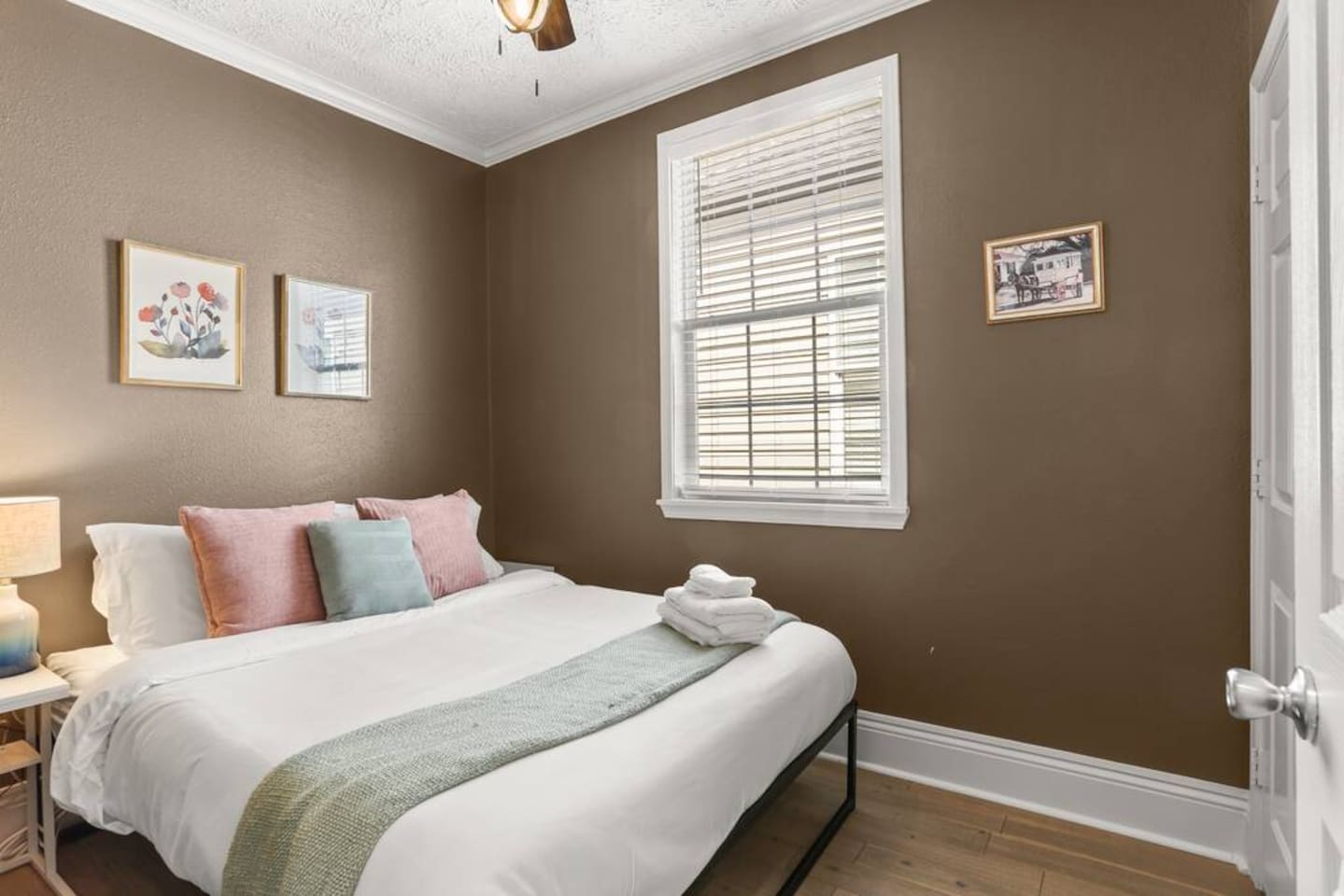 The “Brown” bedroom has a comfy queen bed, closet, extra pillows & everything for a restful stay