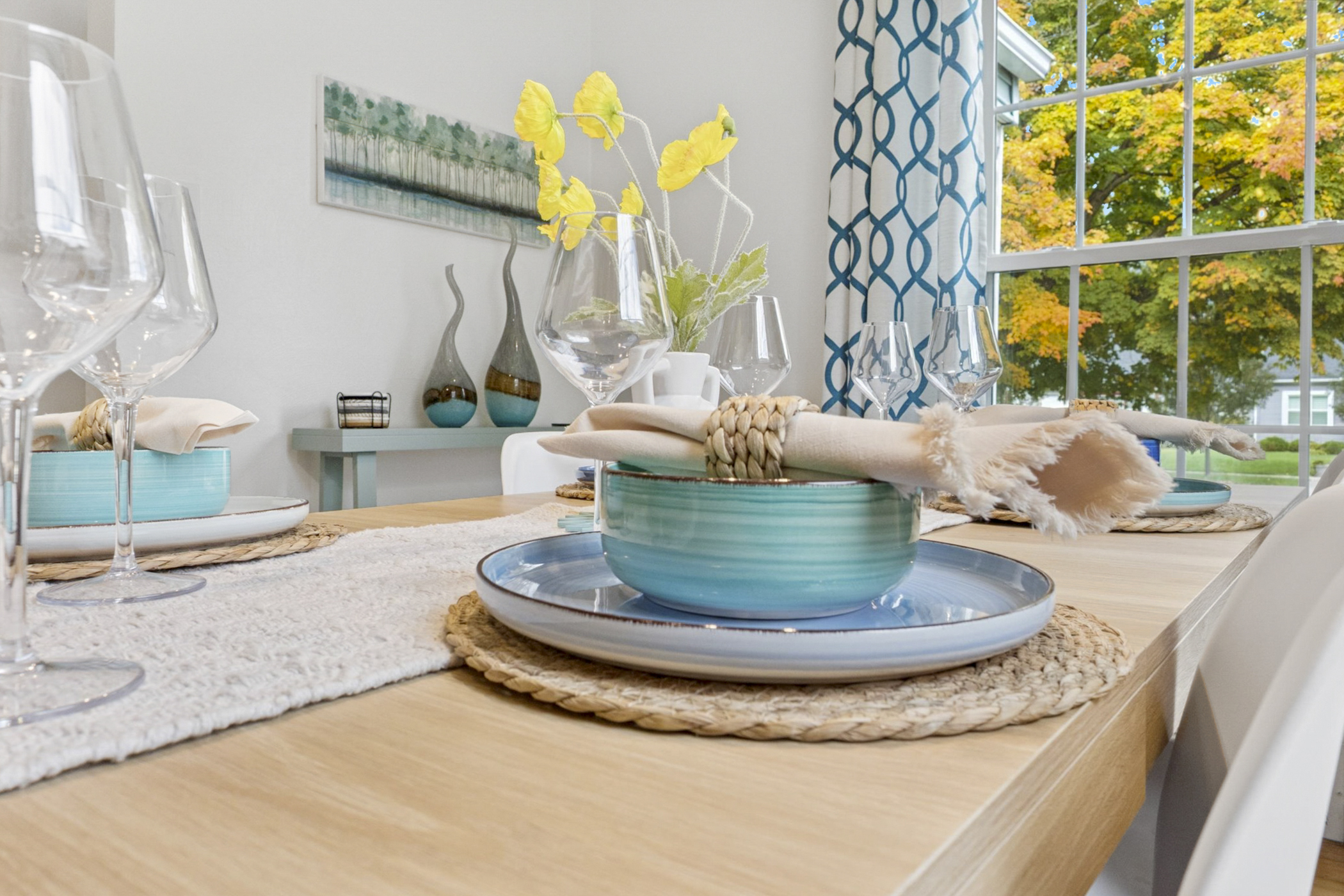 Set to impress—our South Bend guest retreat dining room offers beautiful, colorful dishes for a fancy dinner, plus plastic options for kids or alfresco meals. Style meets practicality near Not