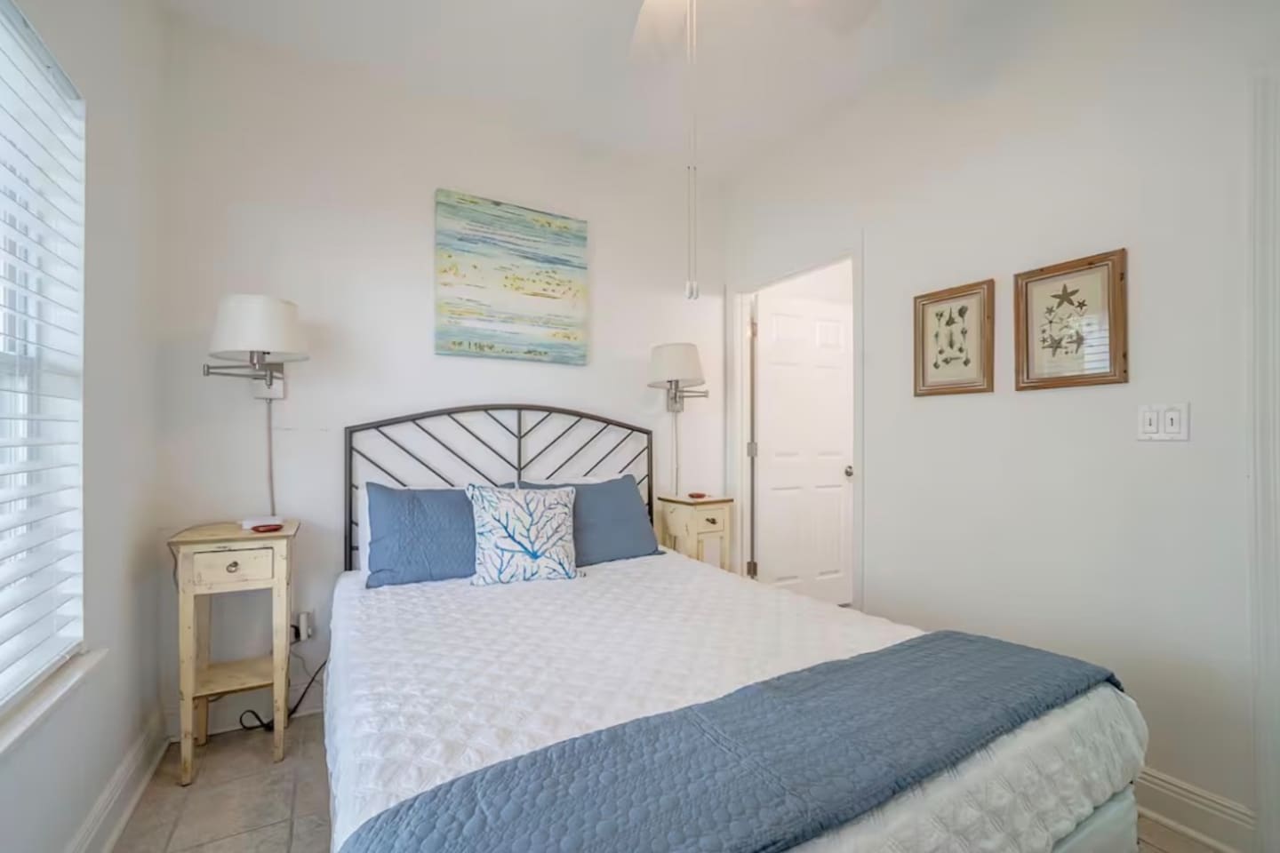Bedroom 4 is on the lower level with queen bed and ensuite private bath