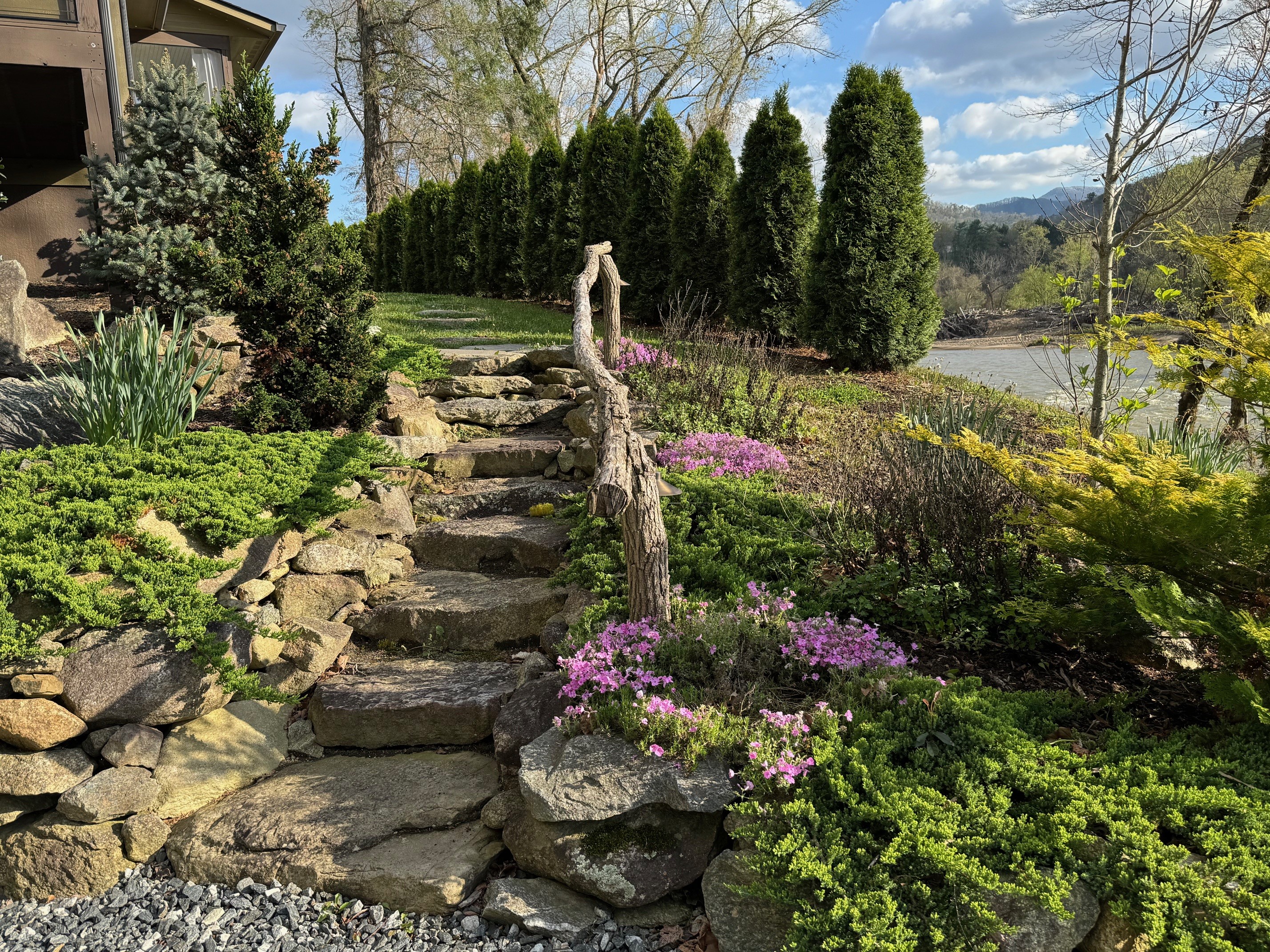 Stone steps from the parking area that lead to the main entrance