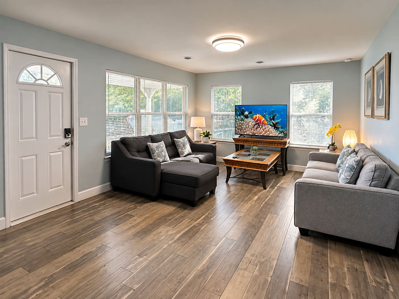 Living Room Retreat: Bright and airy space with modern decor, perfect for relaxation and fun!