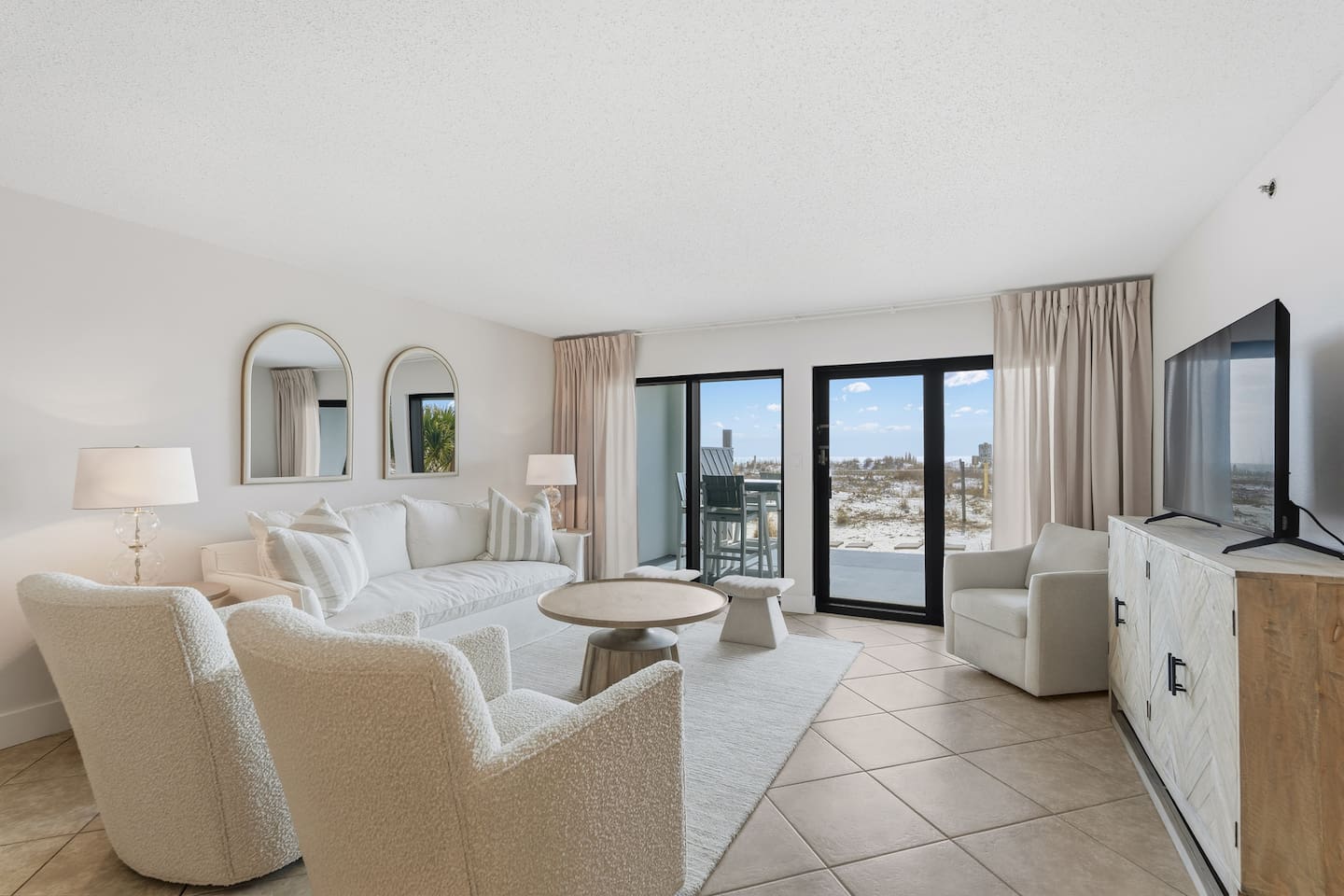 Living room with sliding glass doors to private patio