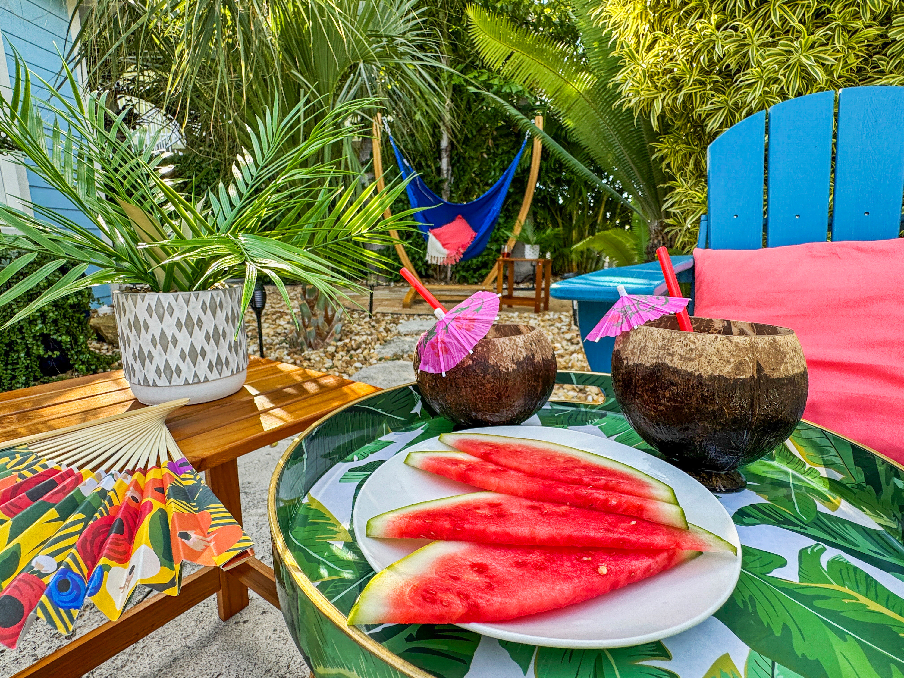 Lounge in the chairs by the pool or the hammock!