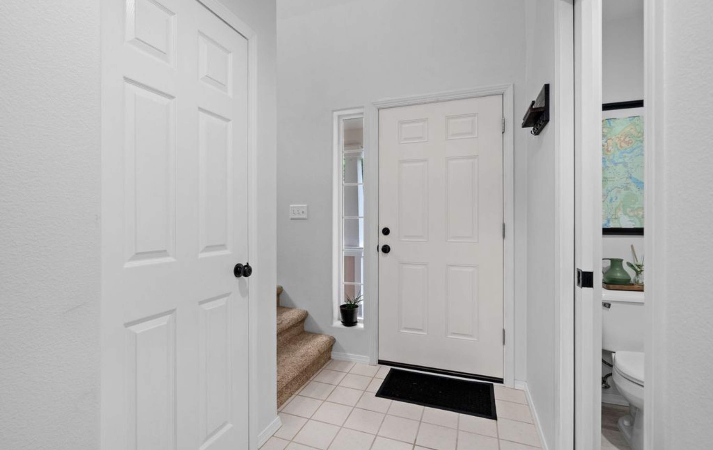 Stairs and half bath