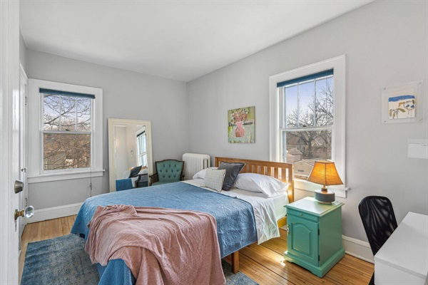 Cozy queen bed, desk and office chair in the Floral Room!
