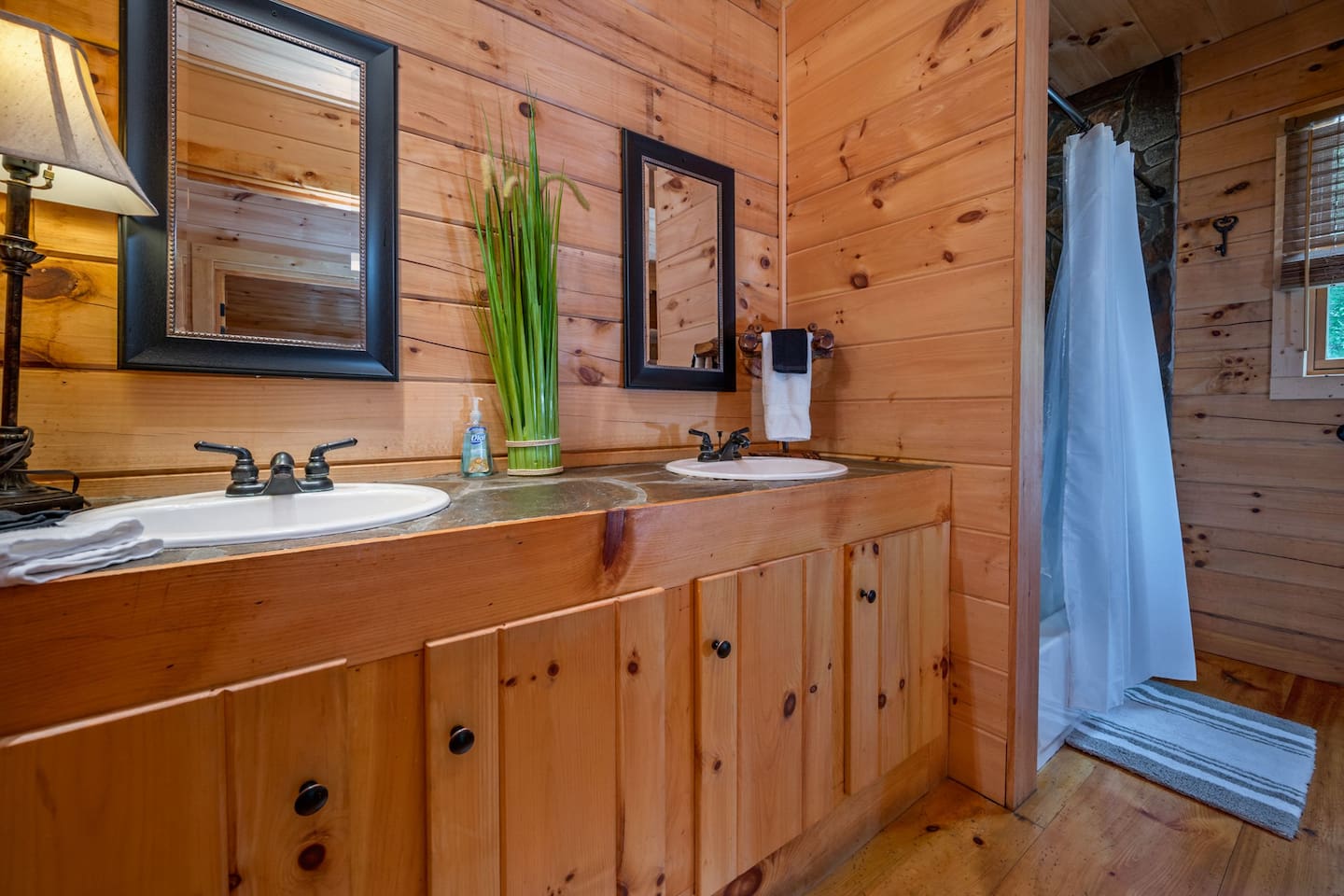 Main floor master with stone hand crafted shower/tub