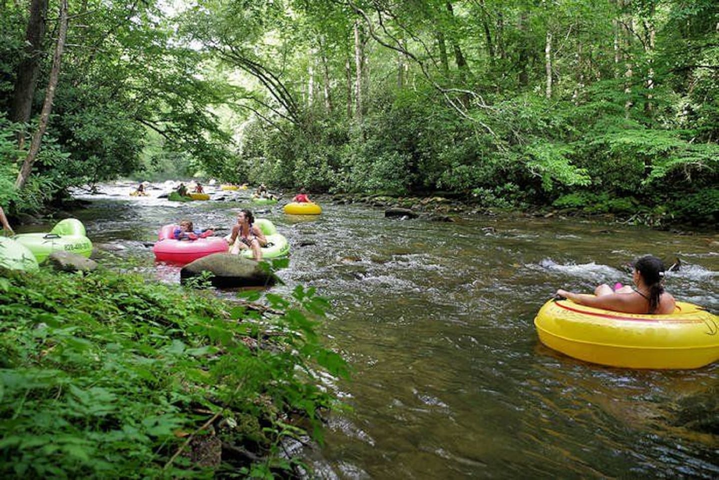 Tubing  through Riverbend at the river- walk from the cabin.