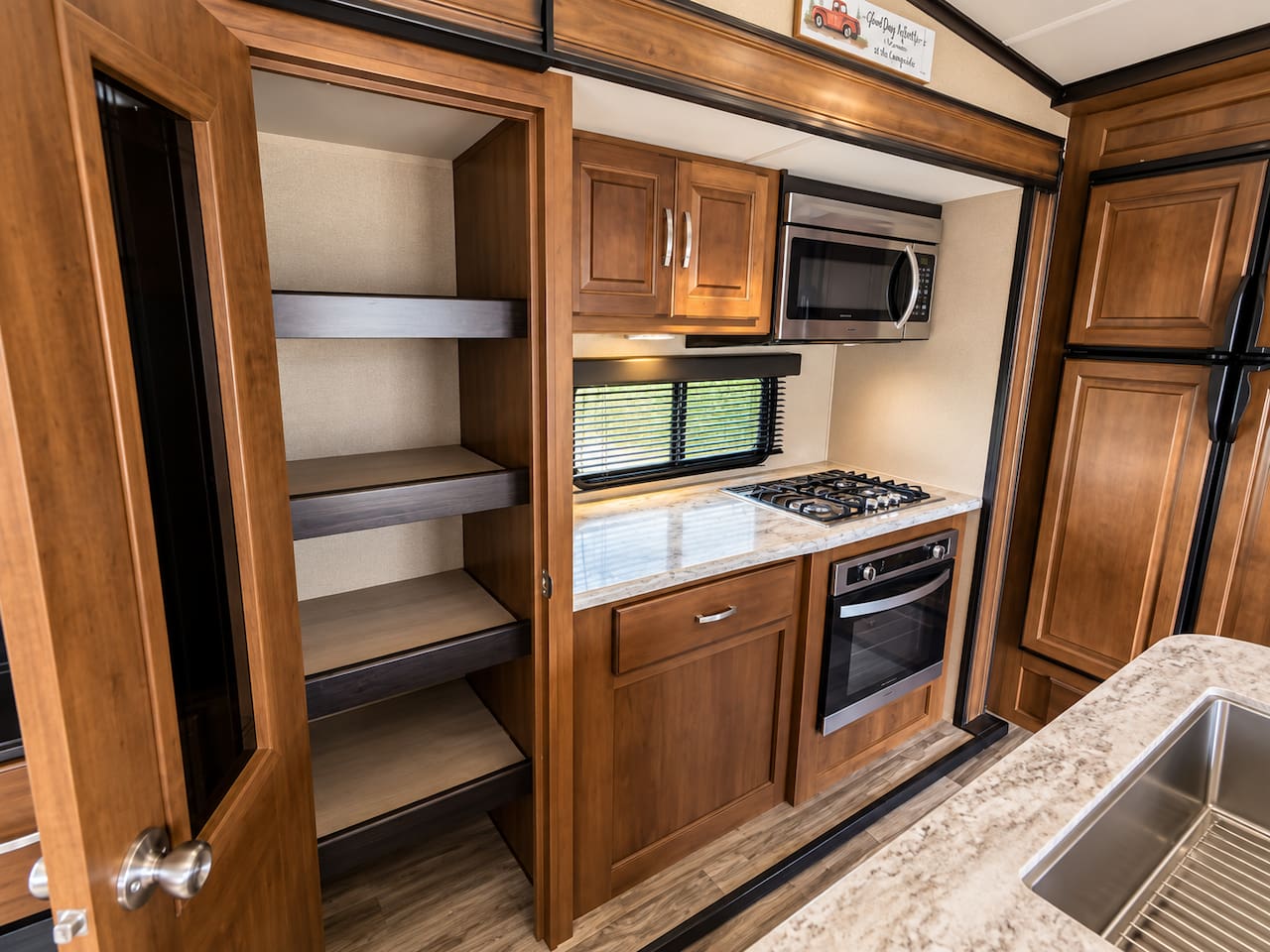 Generously sized pantry, gas stove and oven, microwave.