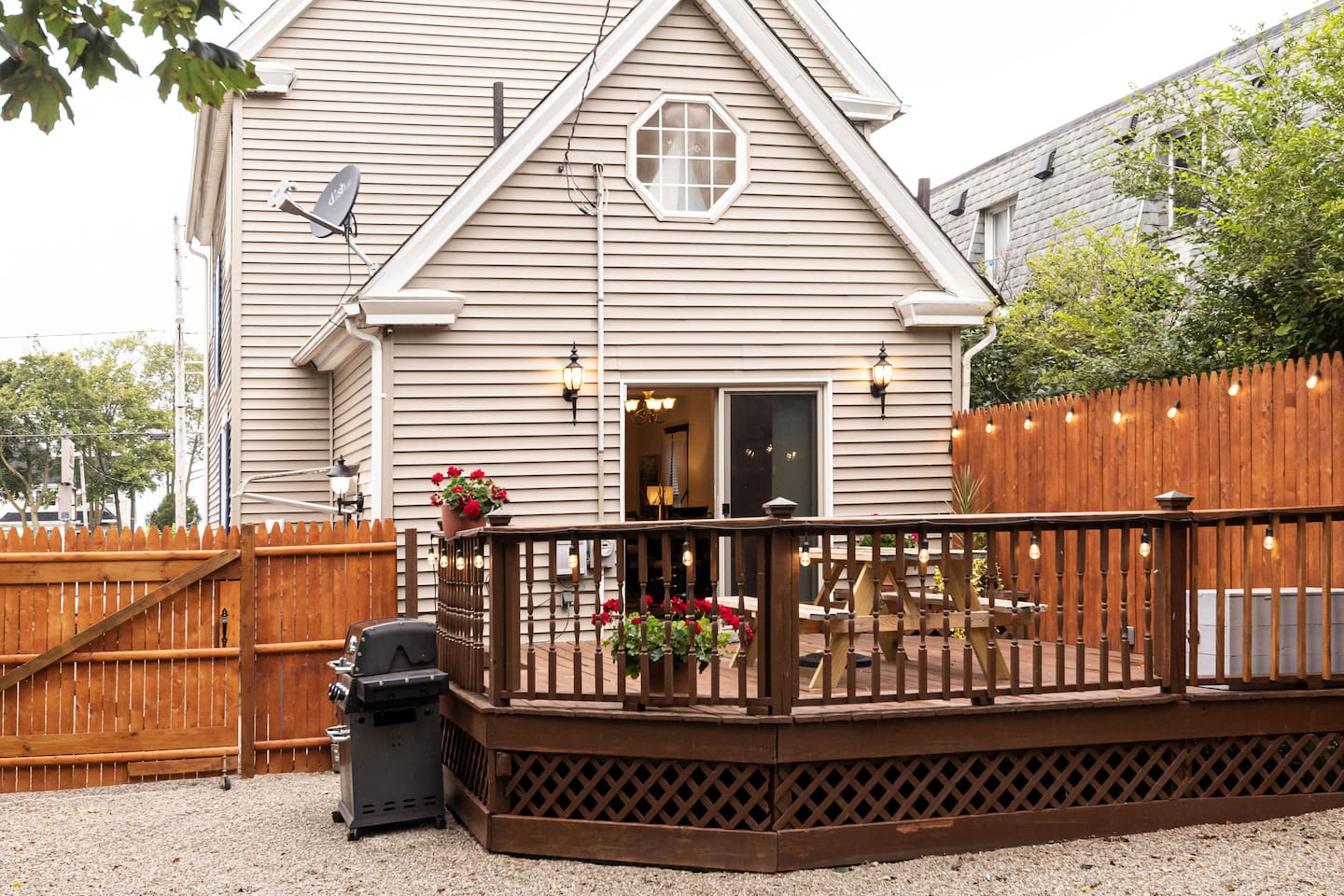 Great raised deck for dinner & drinks, the back yard has plenty of room for corn hole, horse shoes or whatever you feel like playing!