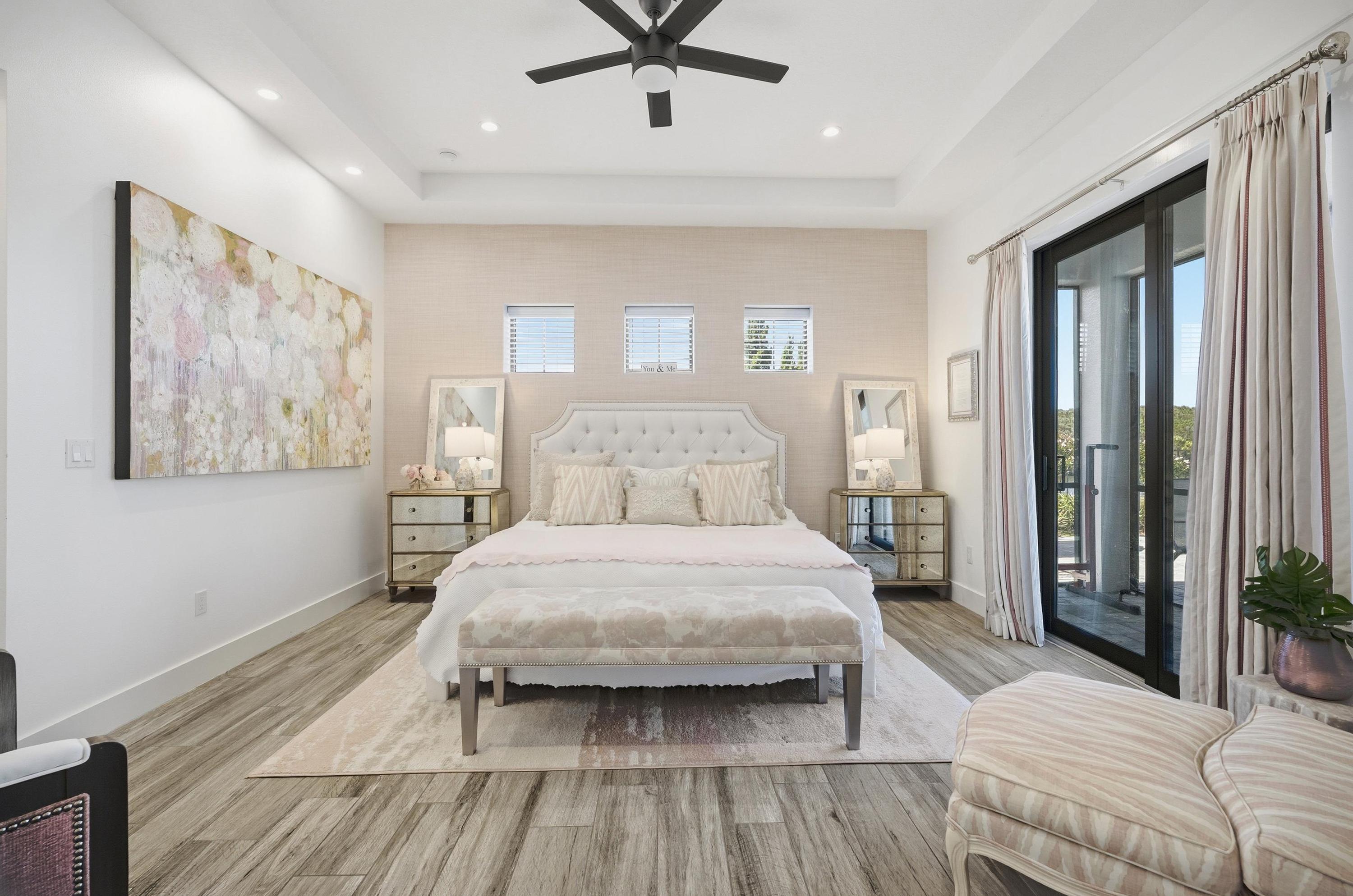 Dreamy primary suite retreat ✨🛏️
Unwind in this bright, serene space with plush bedding, elegant coastal touches, and private balcony access—your perfect end-of-day escape after the beach.