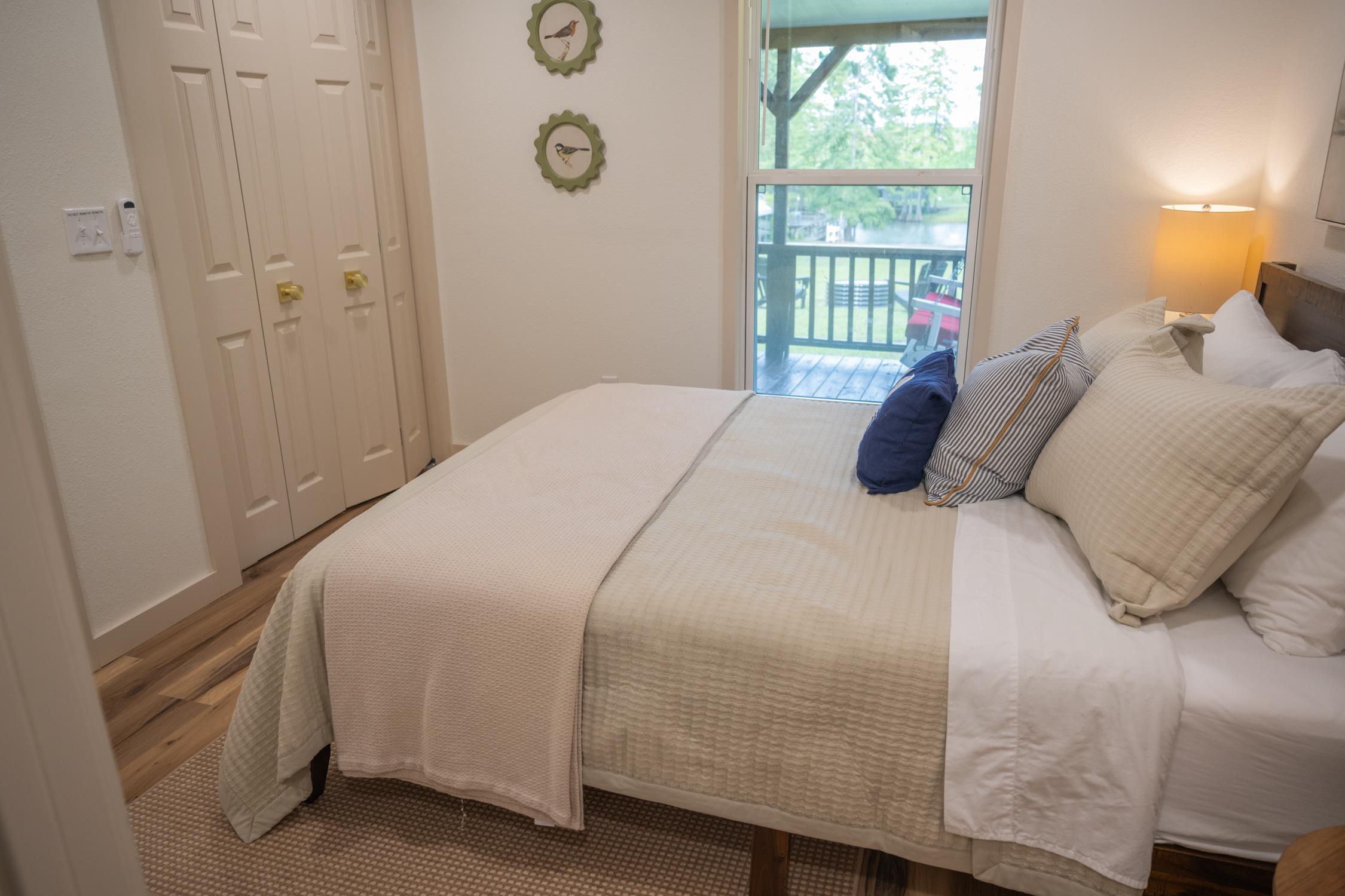 Queen Bedroom 1 with ensuite full bath and lake views