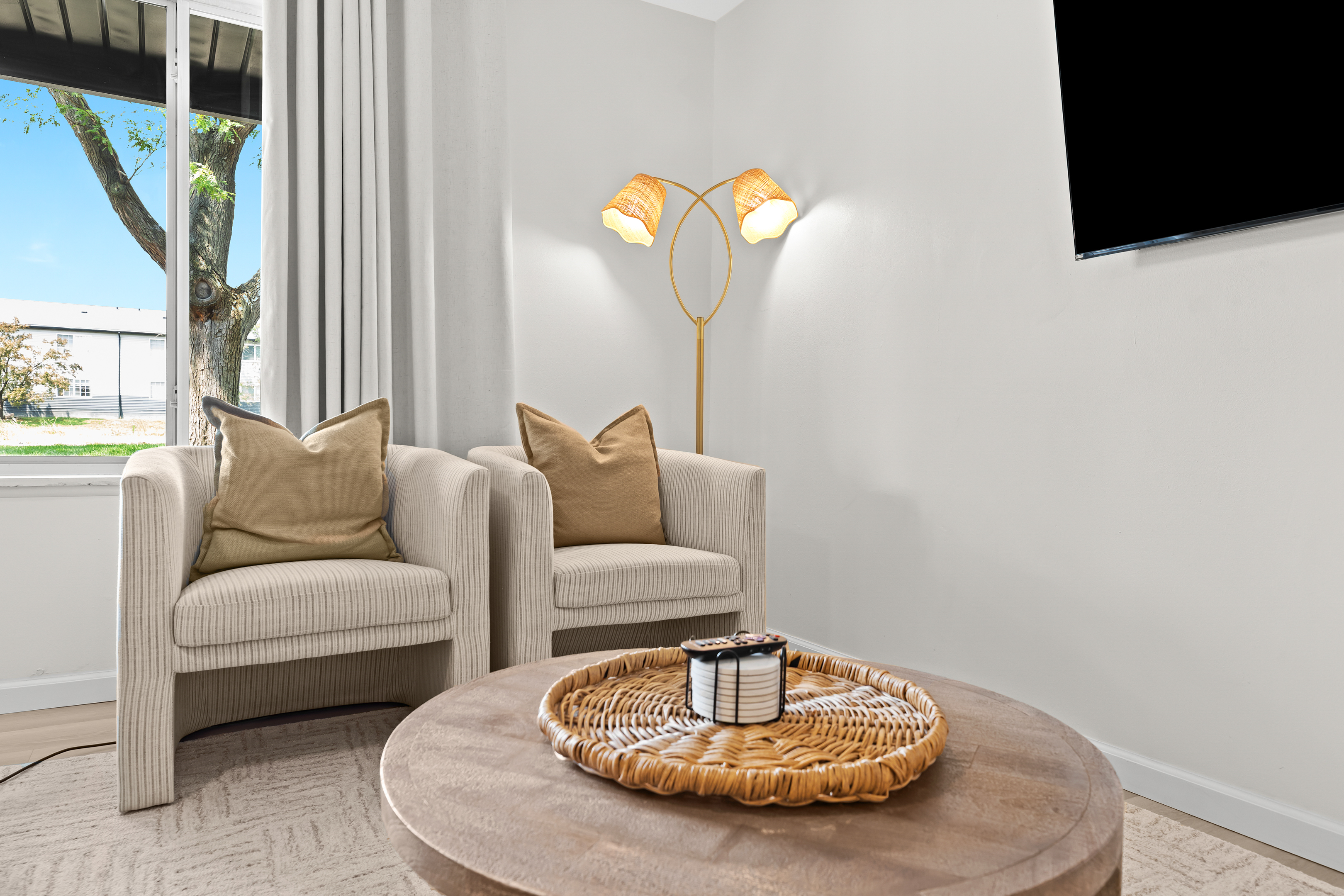 A perfect blend of comfort and design, this living area includes ample seating and direct views of the flat-screen TV.