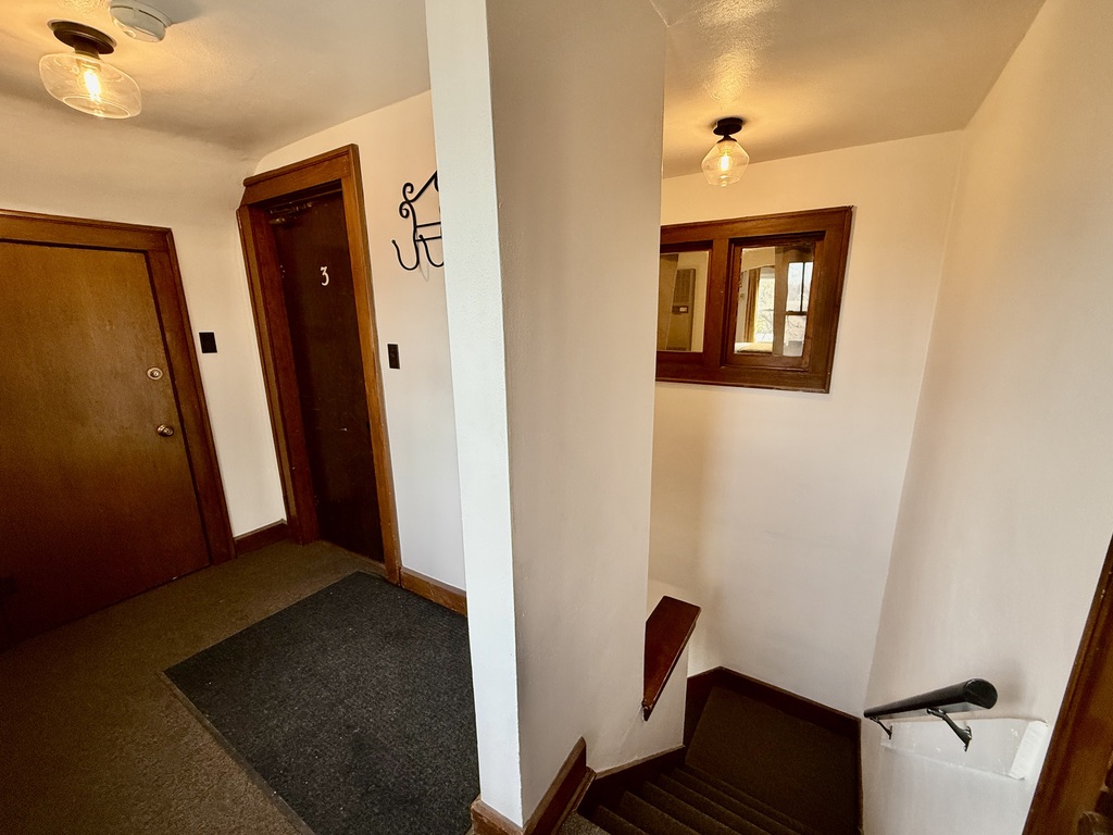 The Lofted Lounge is the entire top floor of the Middlesex Mansion, with a coat rack and shoe storage at the front door. Plus an extra storage closet with private access.