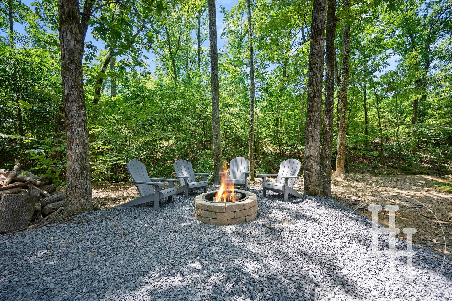 Creekside firepit with 6 chairs. Starter firewood and smore sticks provided
