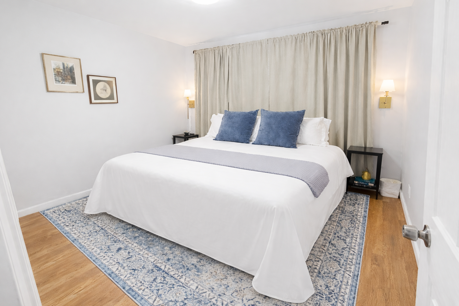 Enjoy a serene bedroom with premium linens, soft lighting, and a clean, modern design—perfect for relaxing after a long day.