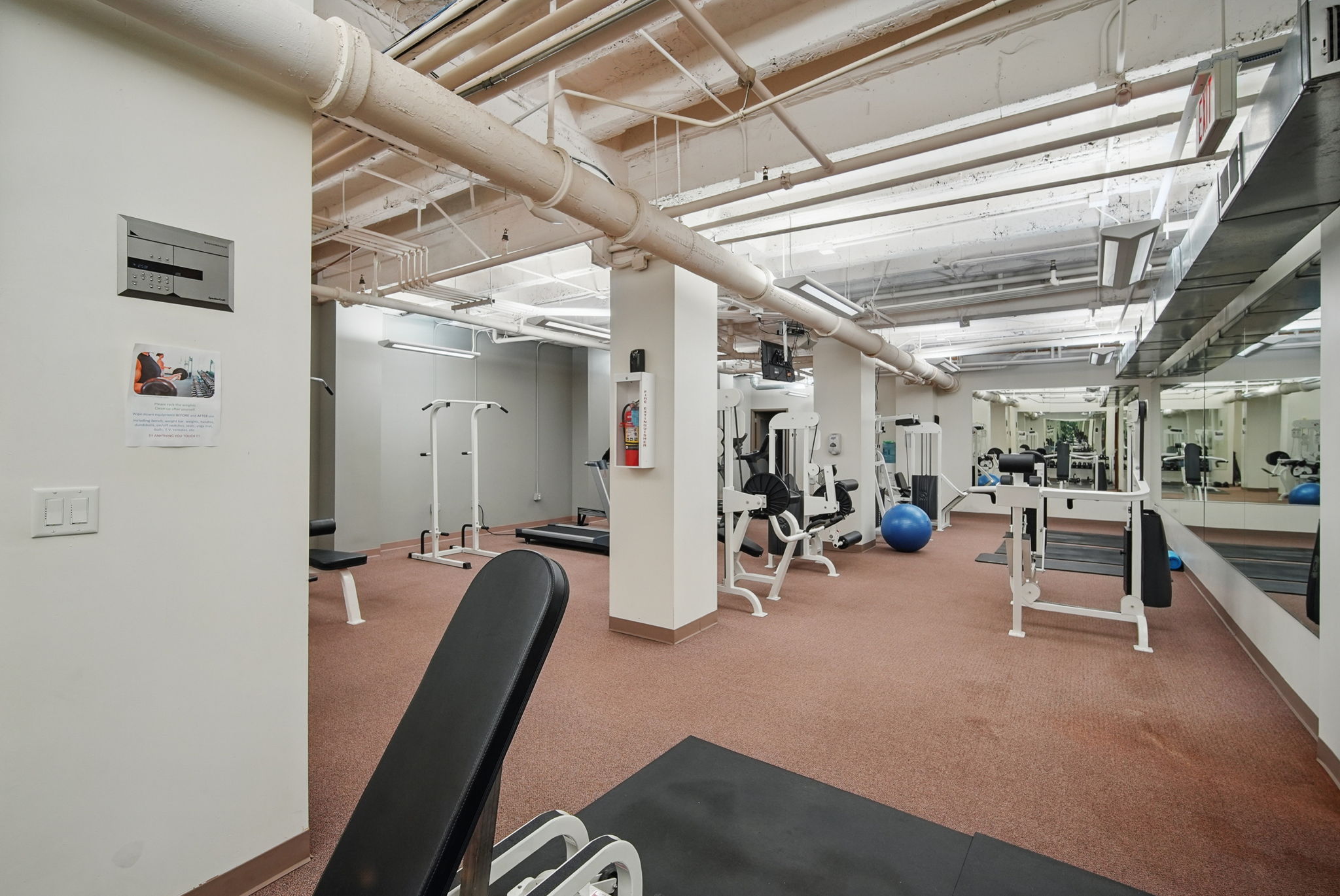 Stay active in the on-site gym featuring cardio, strength equipment, free weights, and mirrors for form.