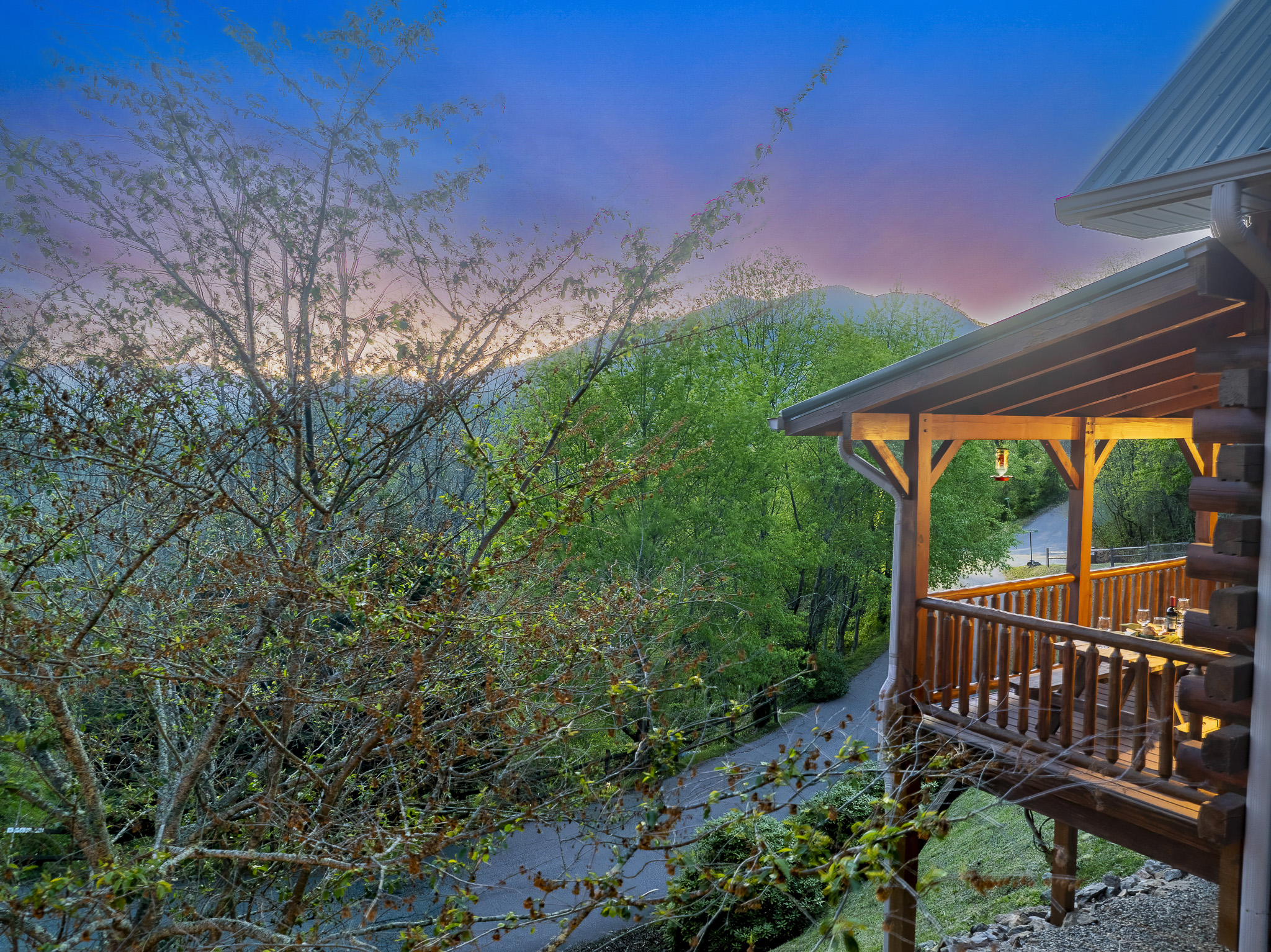 Outdoor Deck: Enjoy mountain views and enchanting sunsets from this inviting balcony retreat!