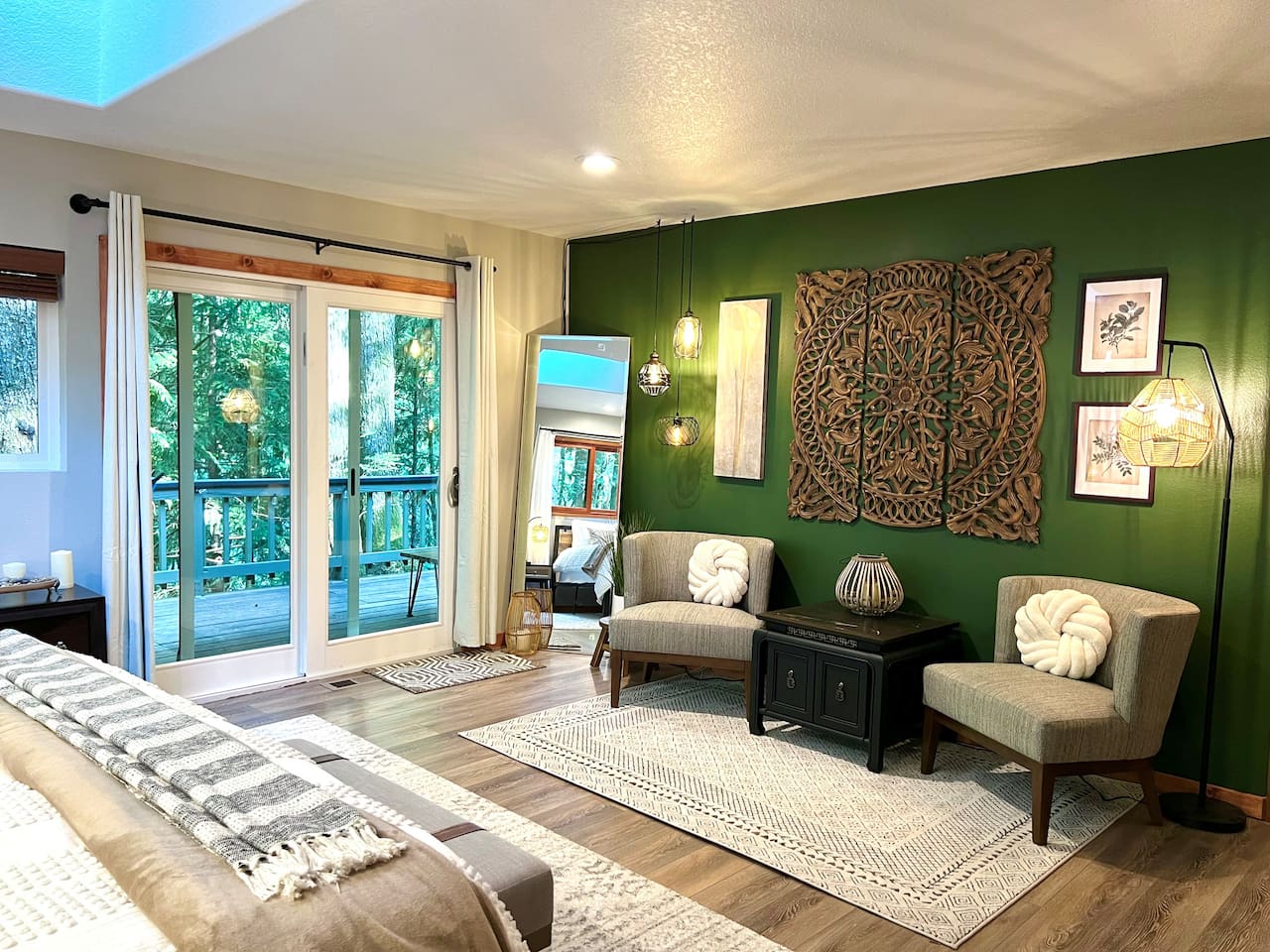 Master bedroom with king bed, Relaxation Station and Back Deck Access.