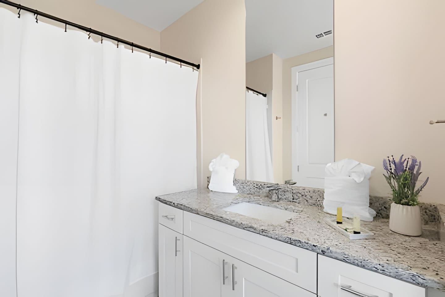 A stylish and functional bathroom with all the essentials for a comfortable stay.