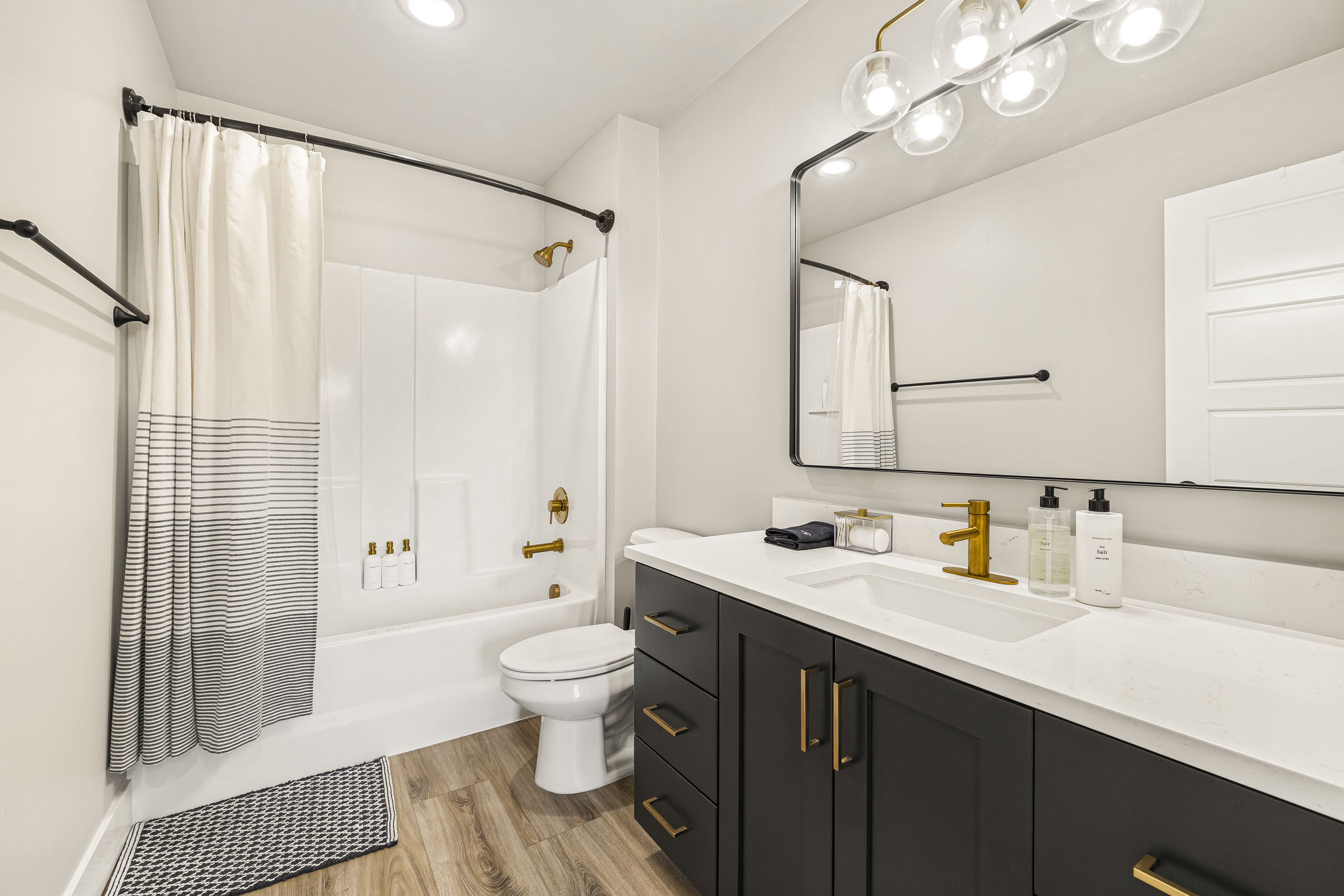 Second full bathroom located upstairs next to bedroom 2 and 3. 