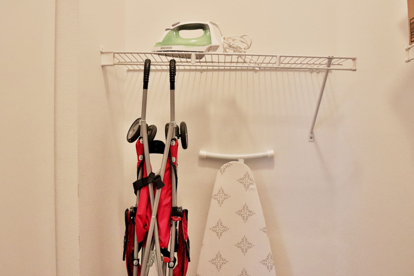 Iron, ironing board, and baby stroller available