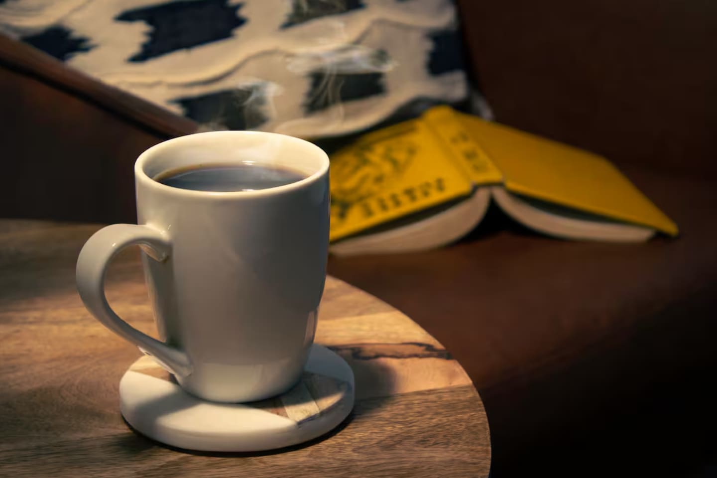 Steam rising off a good cup of coffee, a book cracked open — this is what unwinding looks like.