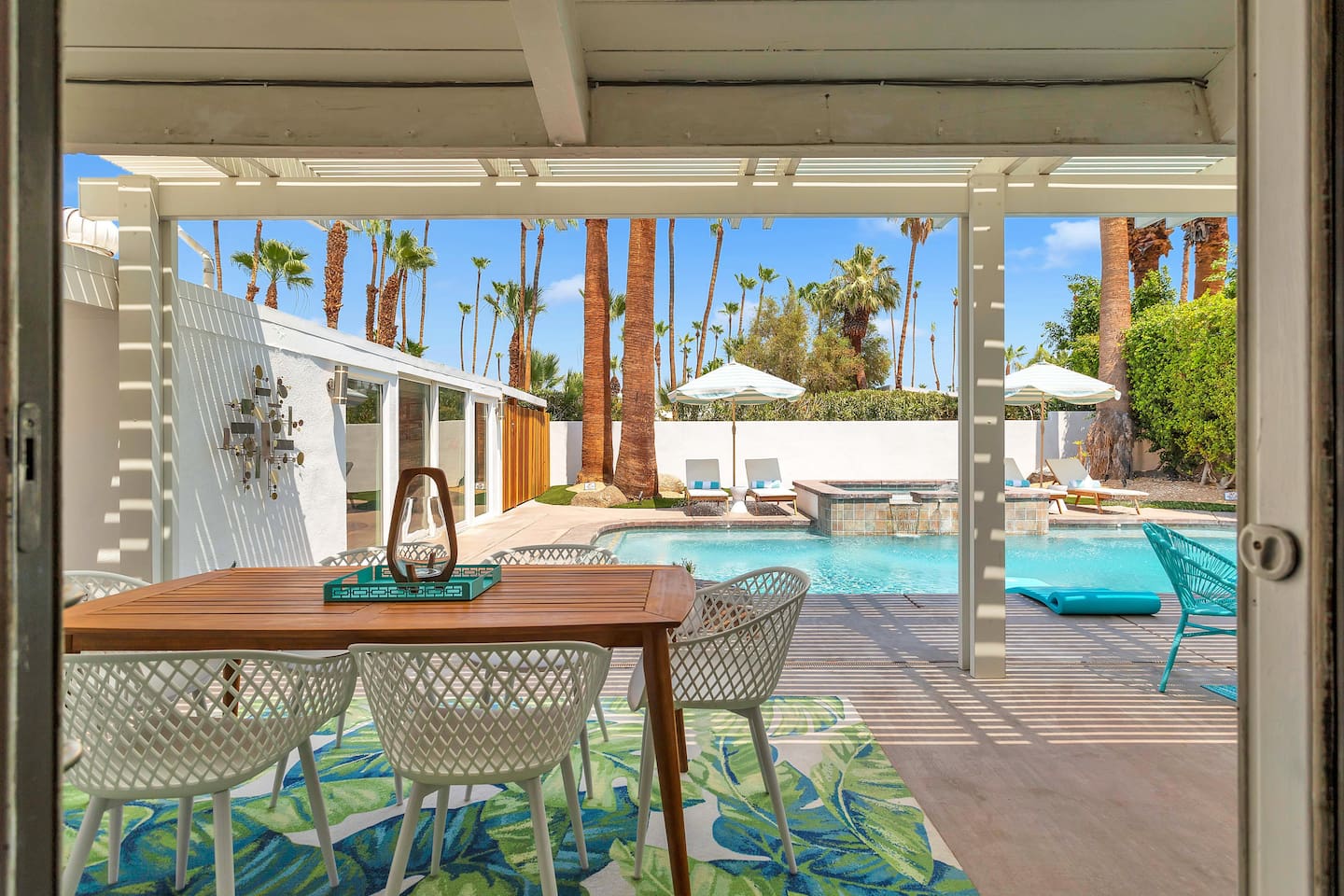 Private secluded pool with mountain and palm tree views