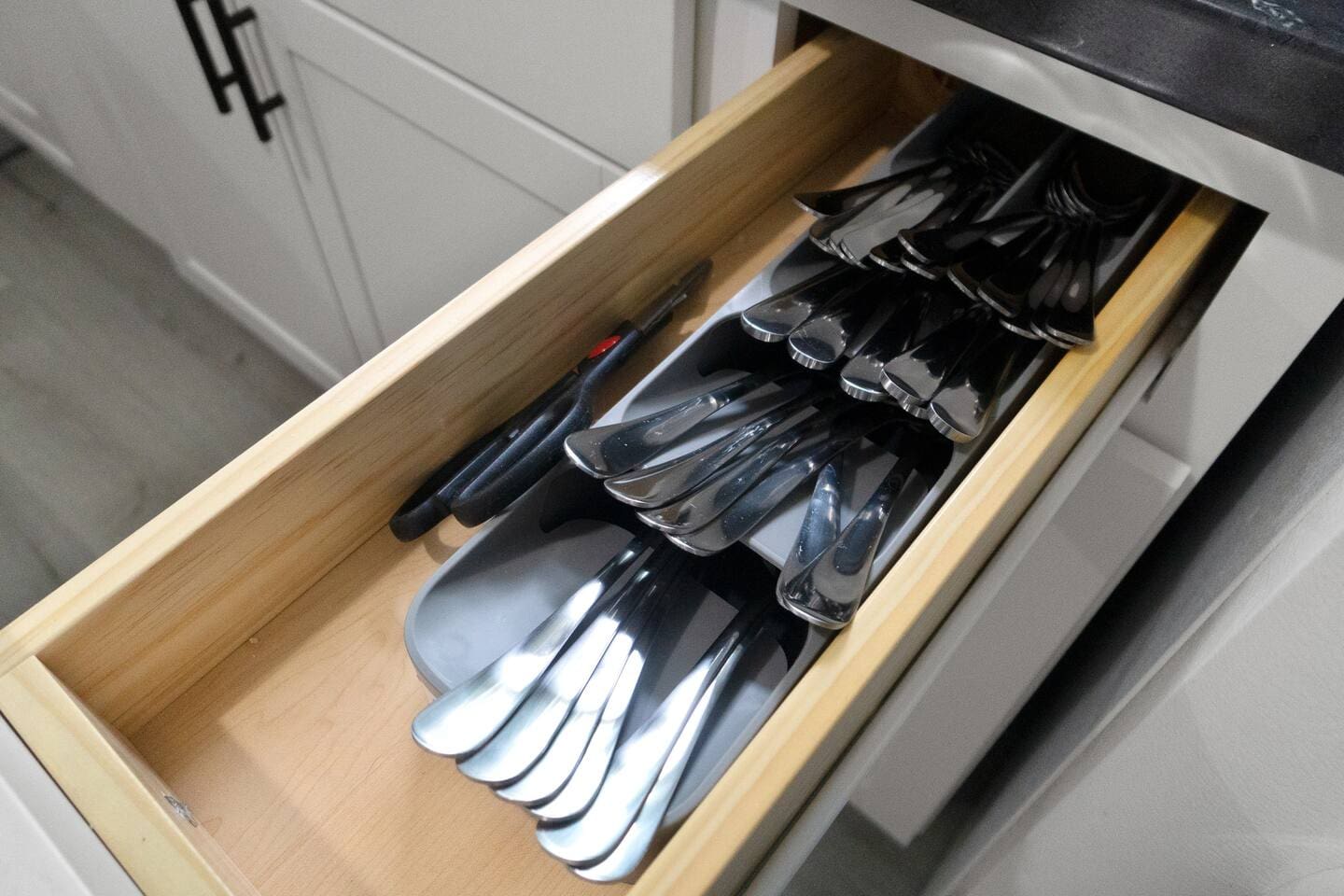 Complete set of spoons and forks, ready for your dining experience.