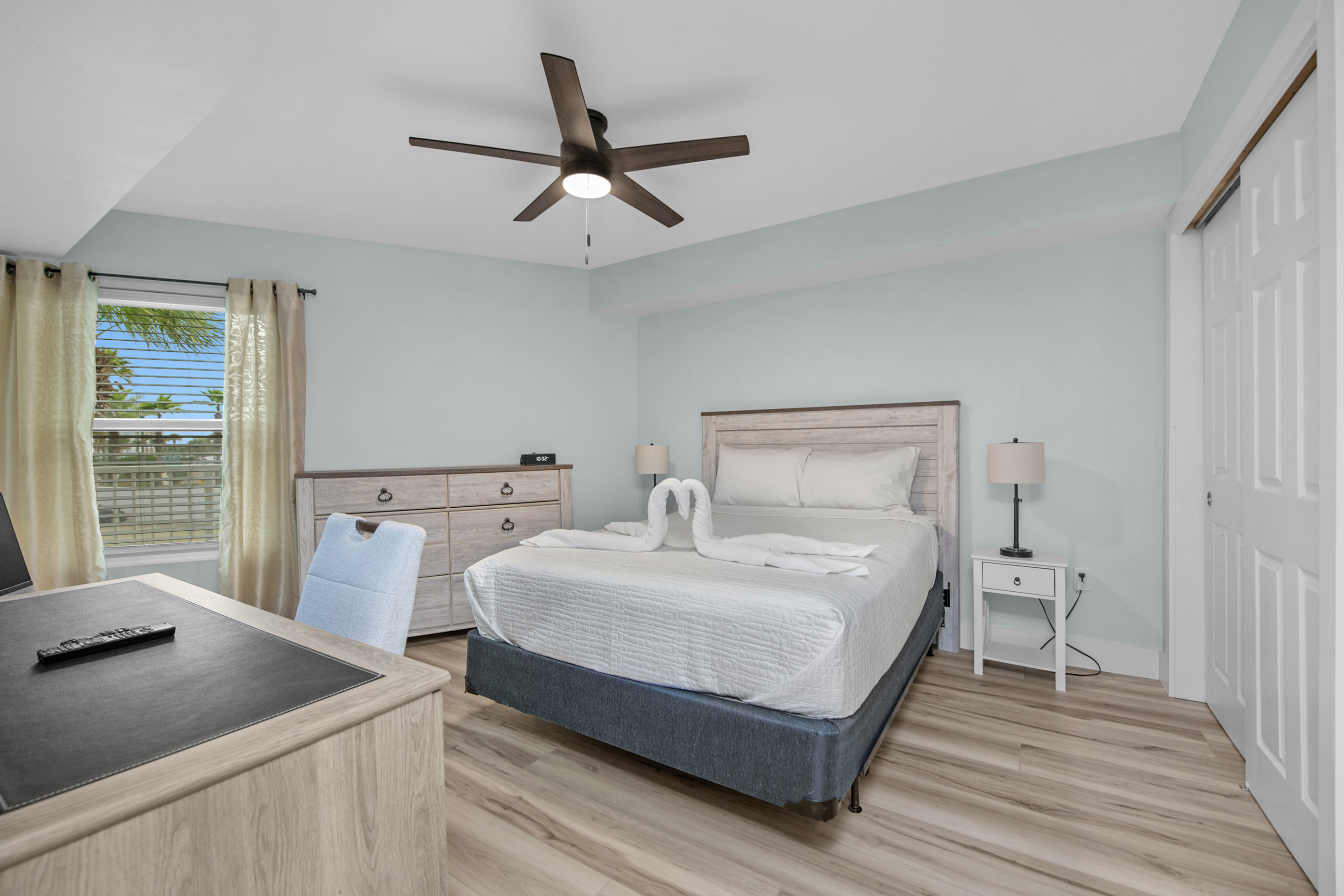 2nd Bedroom with Desk and extra monitor for remote work.