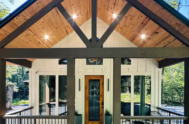 Soaring vaulted ceilings with rustic timber accents