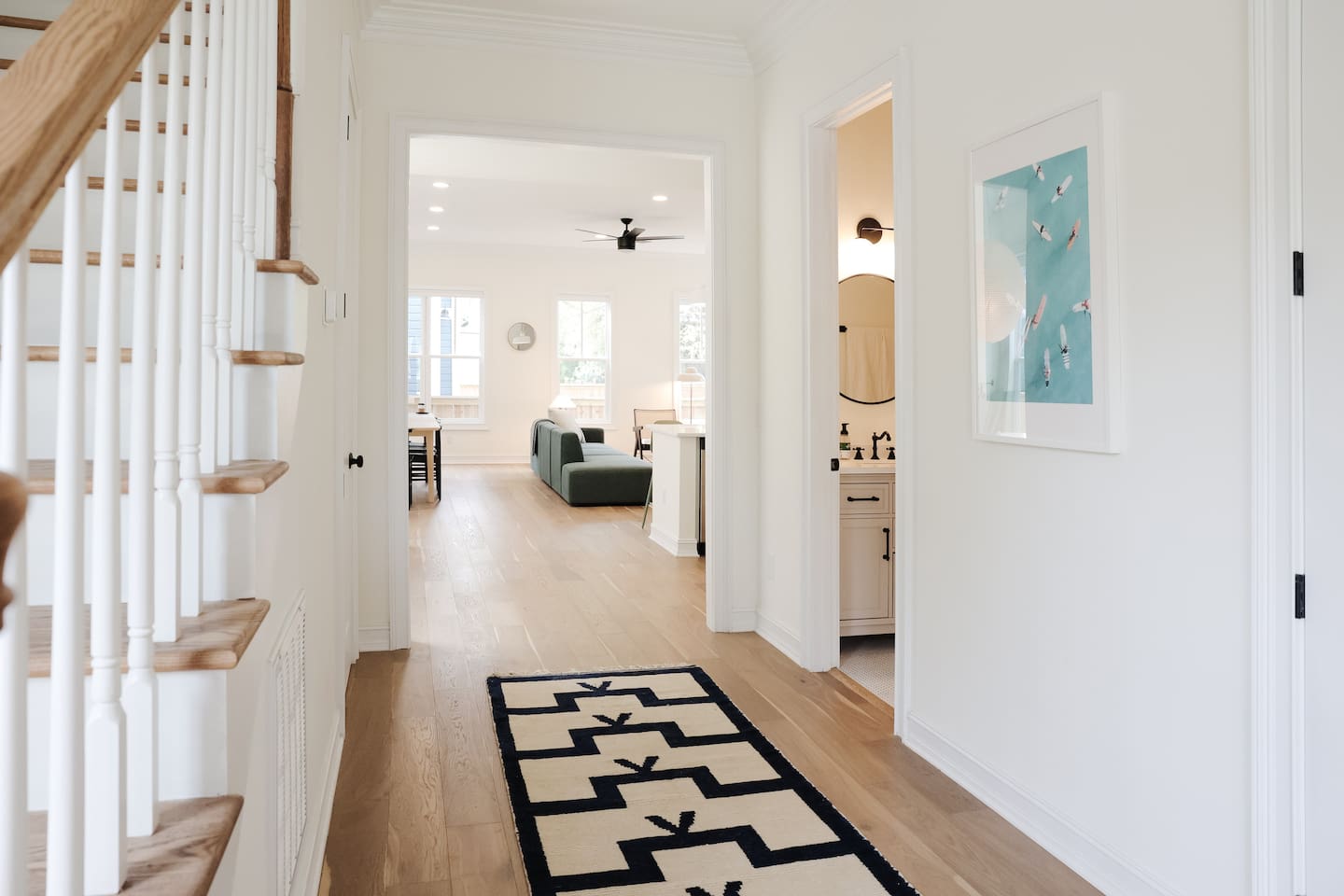 The full bathroom and bedroom are off of the foyer hallway, on the way to the living space.