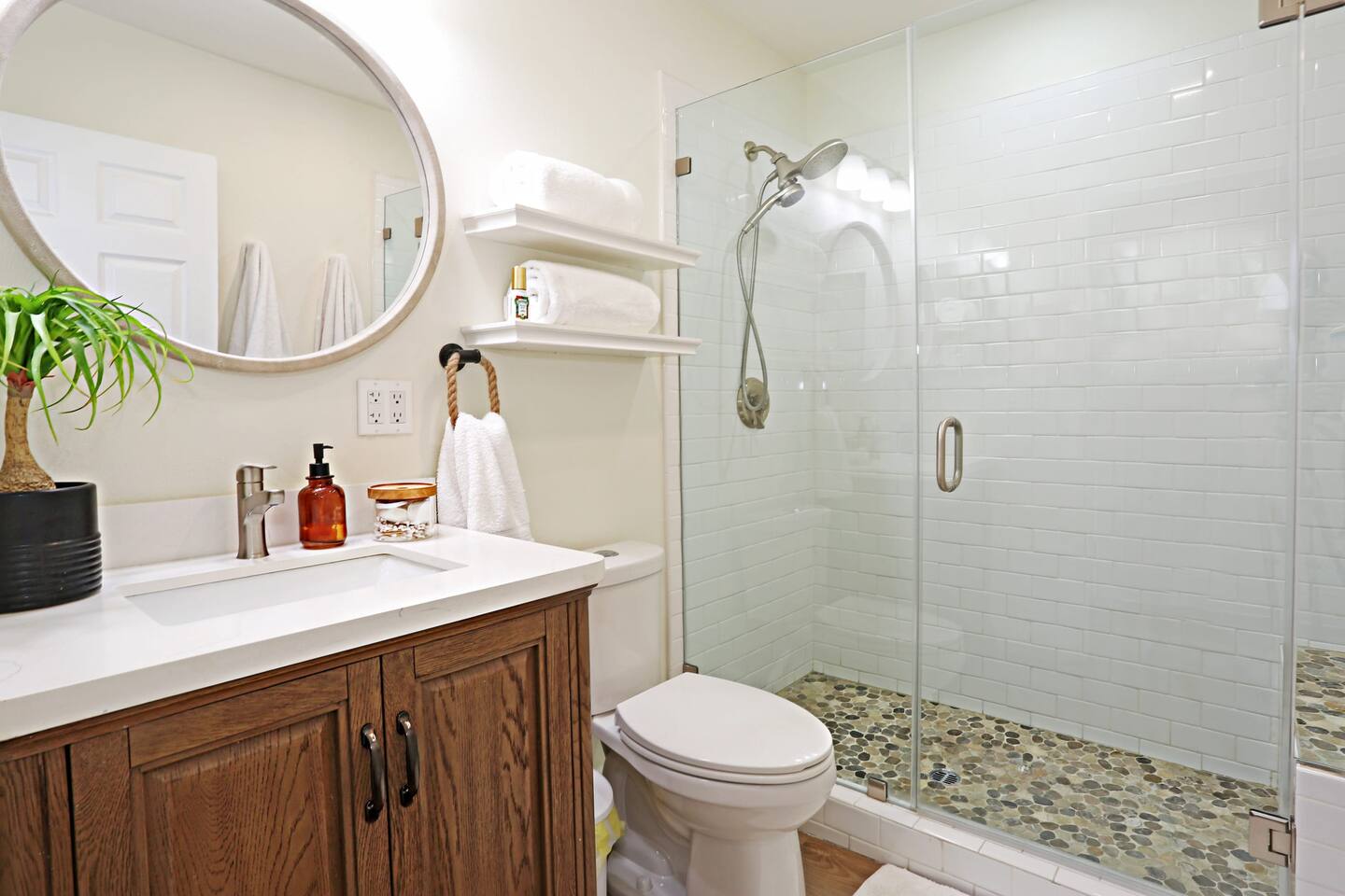The newly remodeled bathroom is fully equipped with a beautiful tile shower, hairdryer, fluffy towels, soap, shampoo, and conditioner. The building also has a water softener so the shower feels luxurious. There are outdoor showers too!