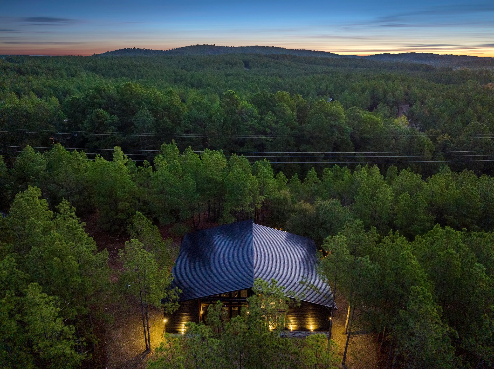 Peaceful woodland cabin with breathtaking mountain sunset scenery