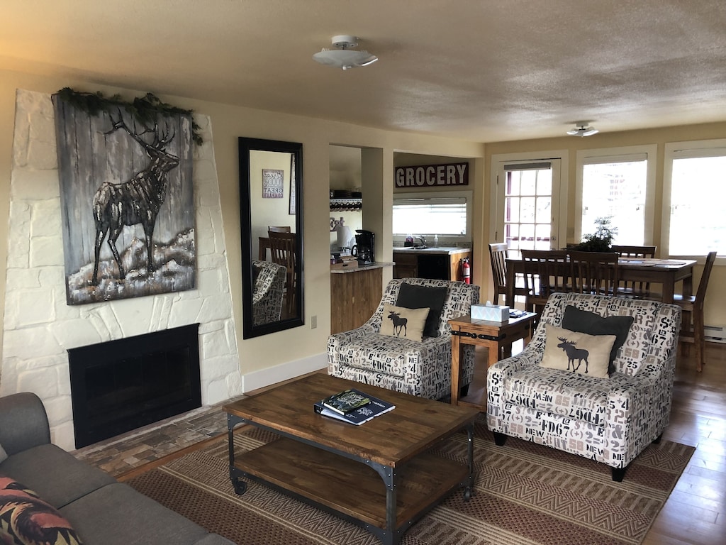 Open floor plan with plenty of seating and natural light