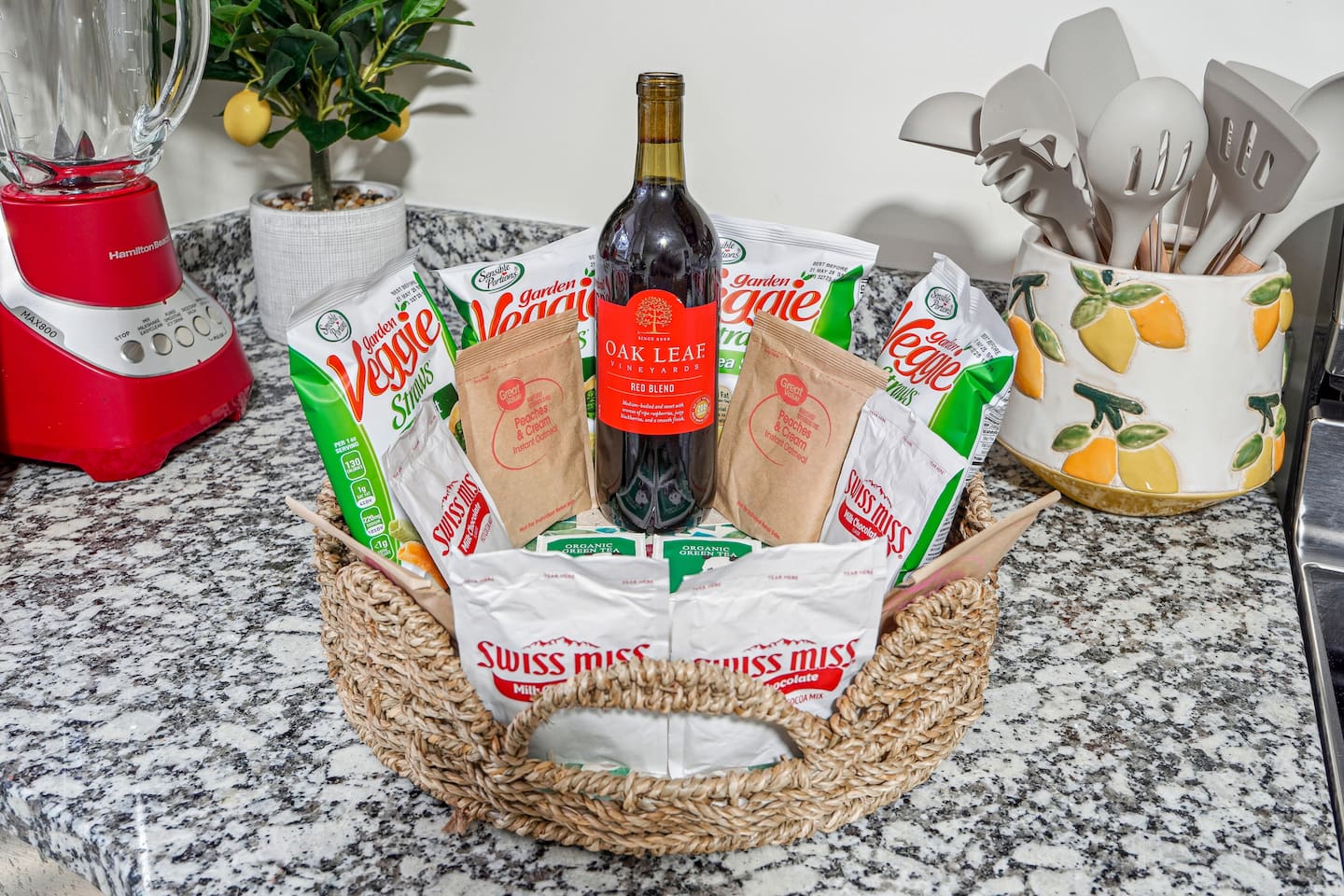 A thoughtful gift basket prepared for guests, featuring tea, coffee, and bottled water — a warm welcome to make your stay even more enjoyable.

