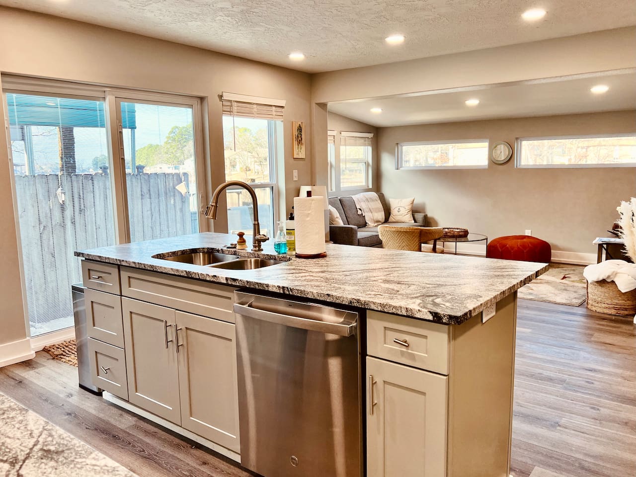 Kitchen: Bright and inviting space with sleek granite countertops and modern appliances!