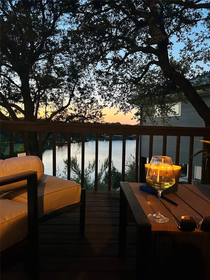 Evening deck seating overlooking the water.