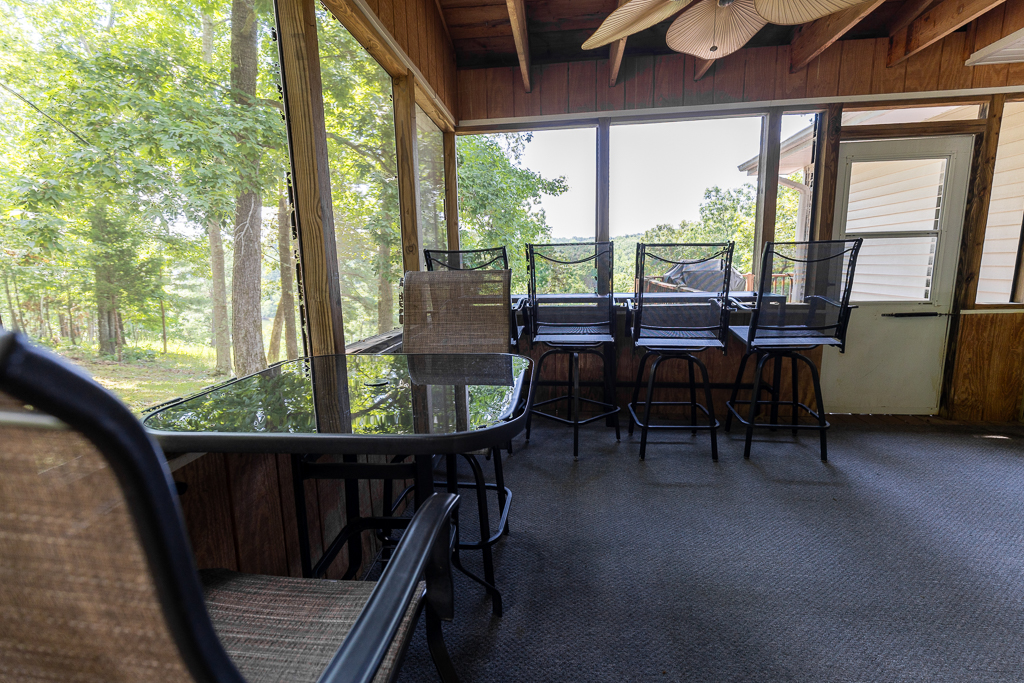 Dine al fresco, rain or shine! The screened porch is perfect for family meals or evening cocktails