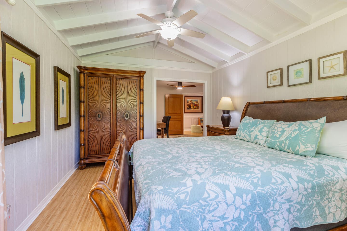 Plantation Suite - Downstairs 
King-size bed and attached lanai.