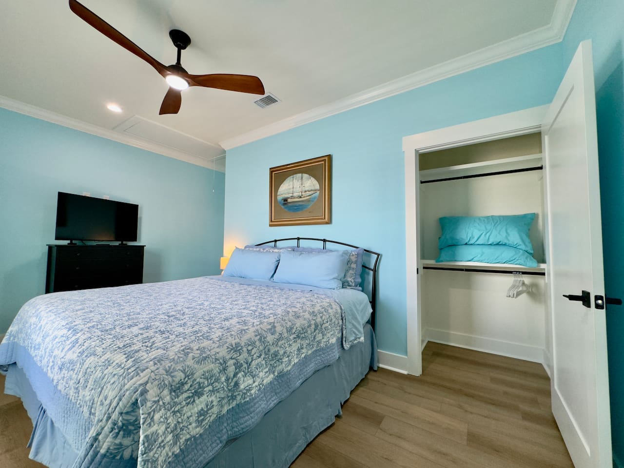 Unwind in a soft, coastal room with gentle natural light.