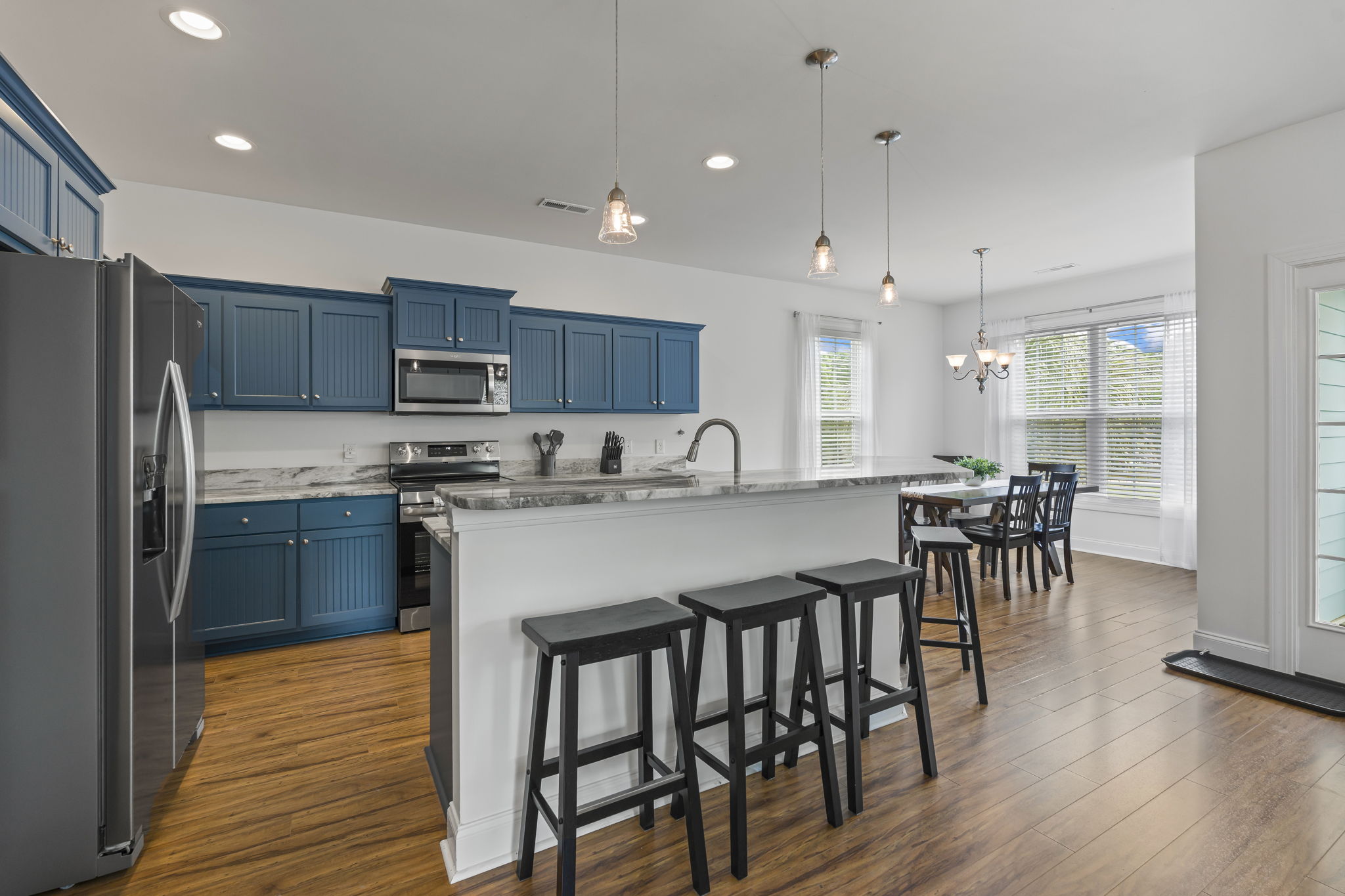 Gorgeous kitchen with stainless steel appliances, new cabinets and granite countertops