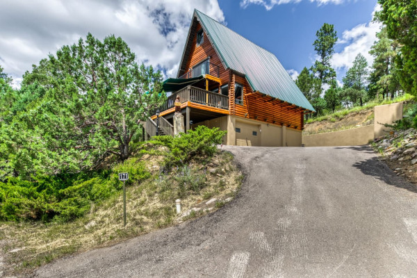 Wake up to the sounds of nature in this beautiful cabin surrounded by trees, offering the ultimate peaceful escape