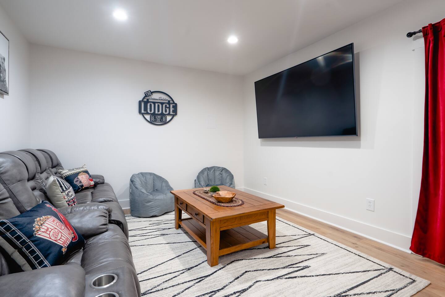 Theater room with recliner seating, at 86 inch 4k TV!